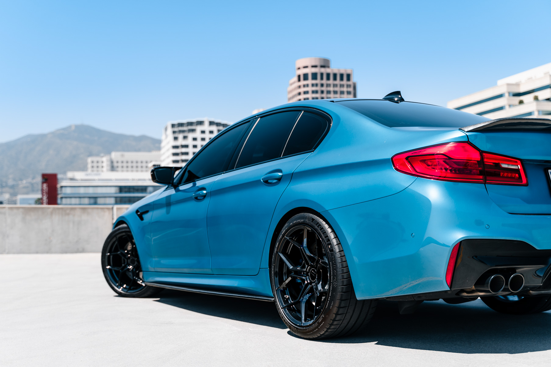 A 2020 BMW M5 on 20 Inch Blaque Diamond BD-F25 Gloss Black Wheels