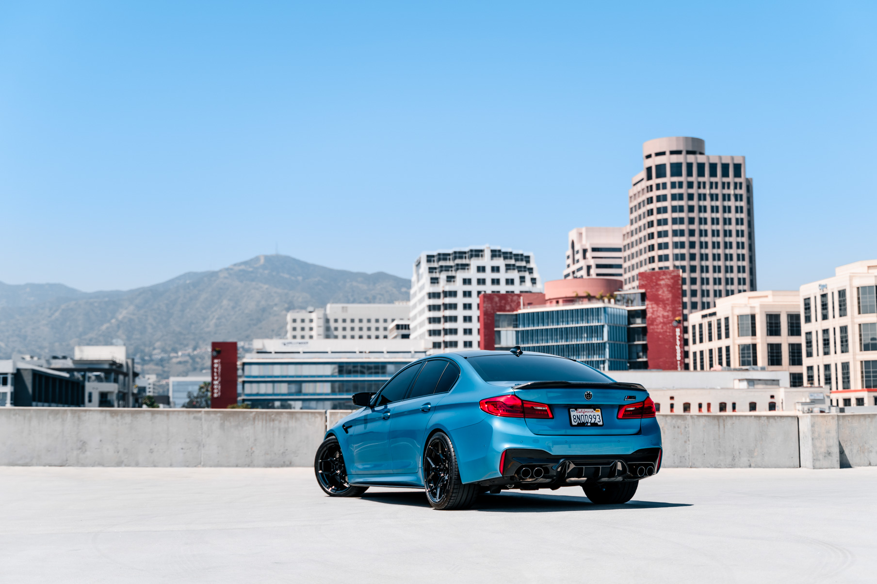 A 2020 BMW M5 on 20 Inch Blaque Diamond BD-F25 Gloss Black Wheels