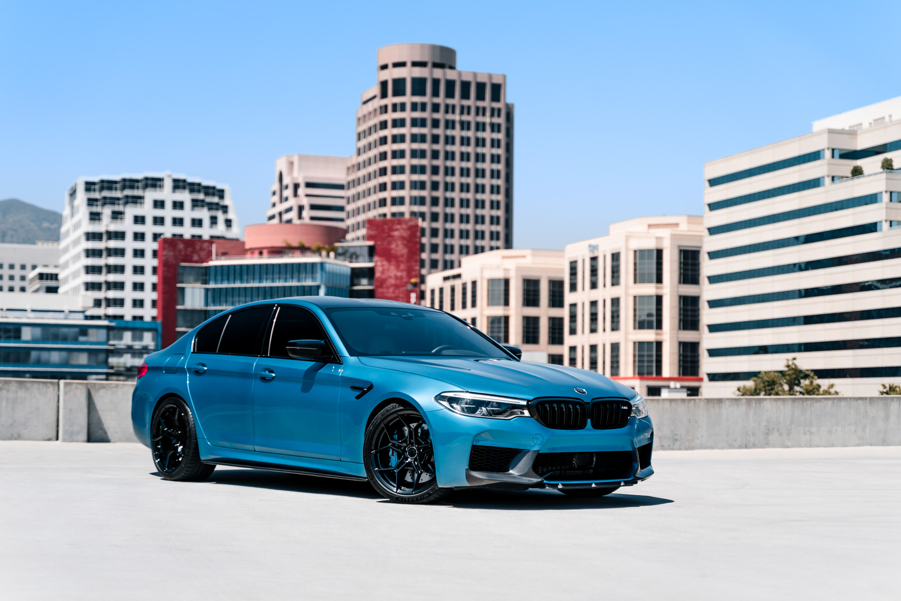 A 2020 BMW M5 on 20 Inch Blaque Diamond BD-F25 Gloss Black Wheels