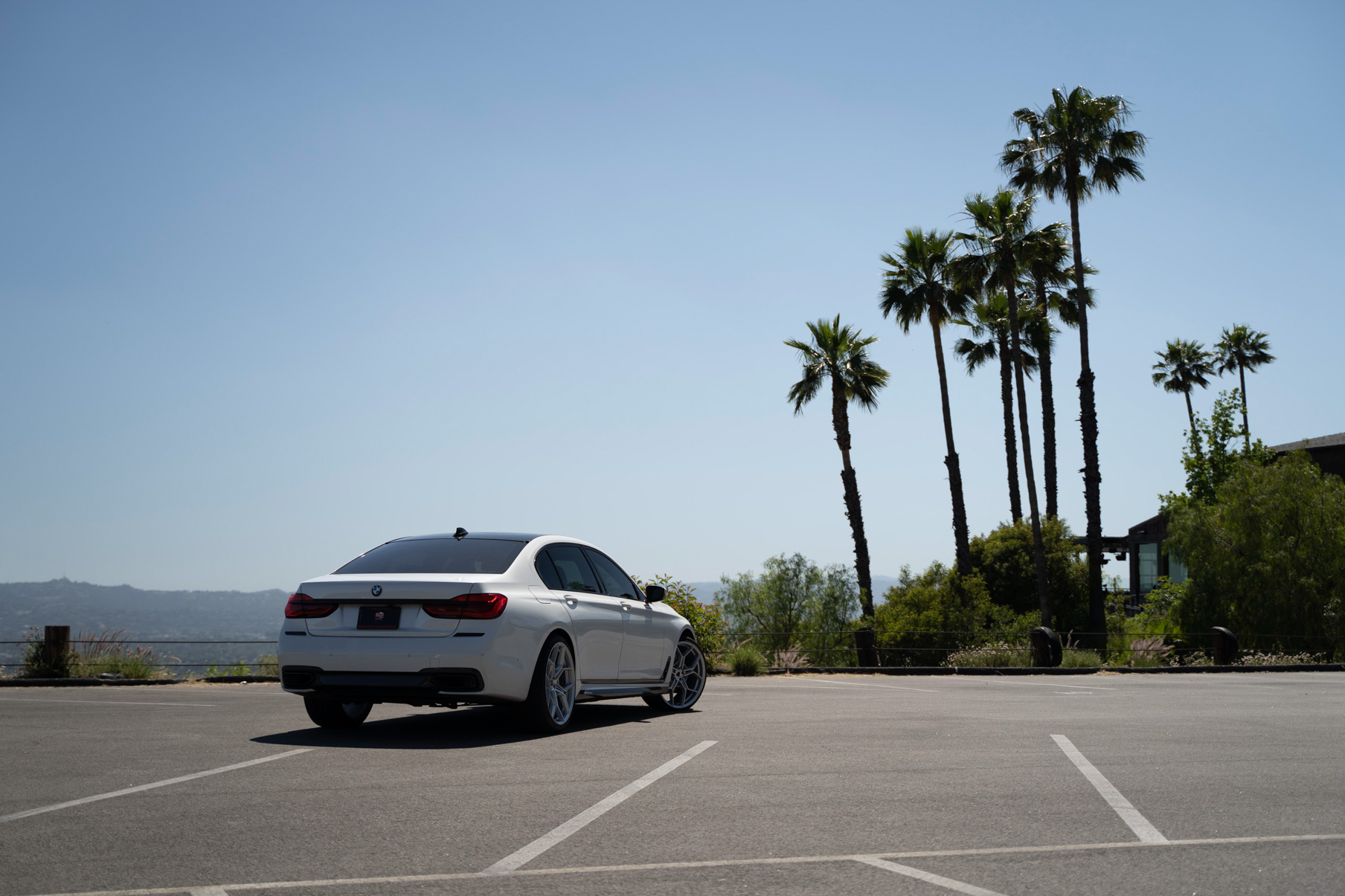 A 2020 BMW 7 Series on Blaque Diamond BD-F25 Brushed Silver Wheels