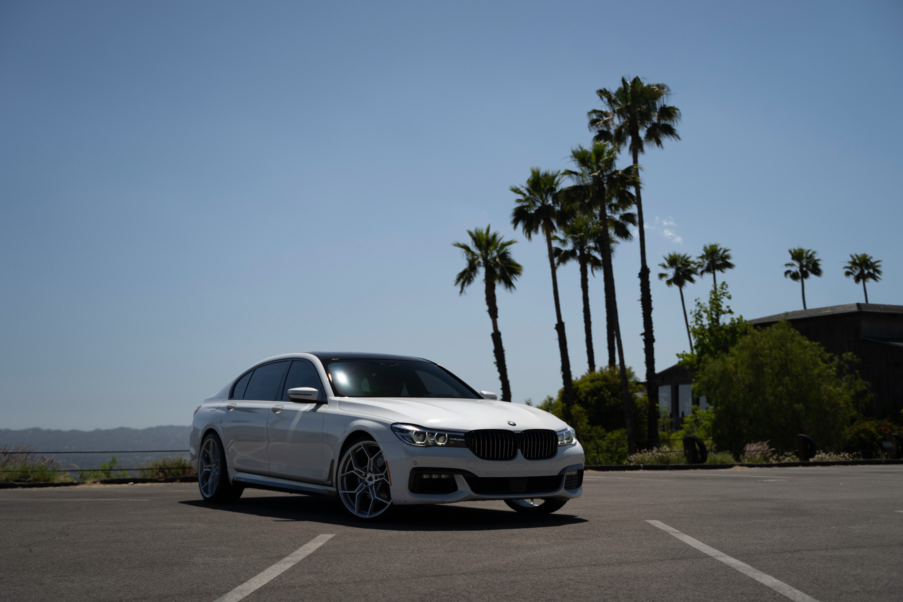 A 2020 BMW 7 Series on Blaque Diamond BD-F25 Brushed Silver Wheels