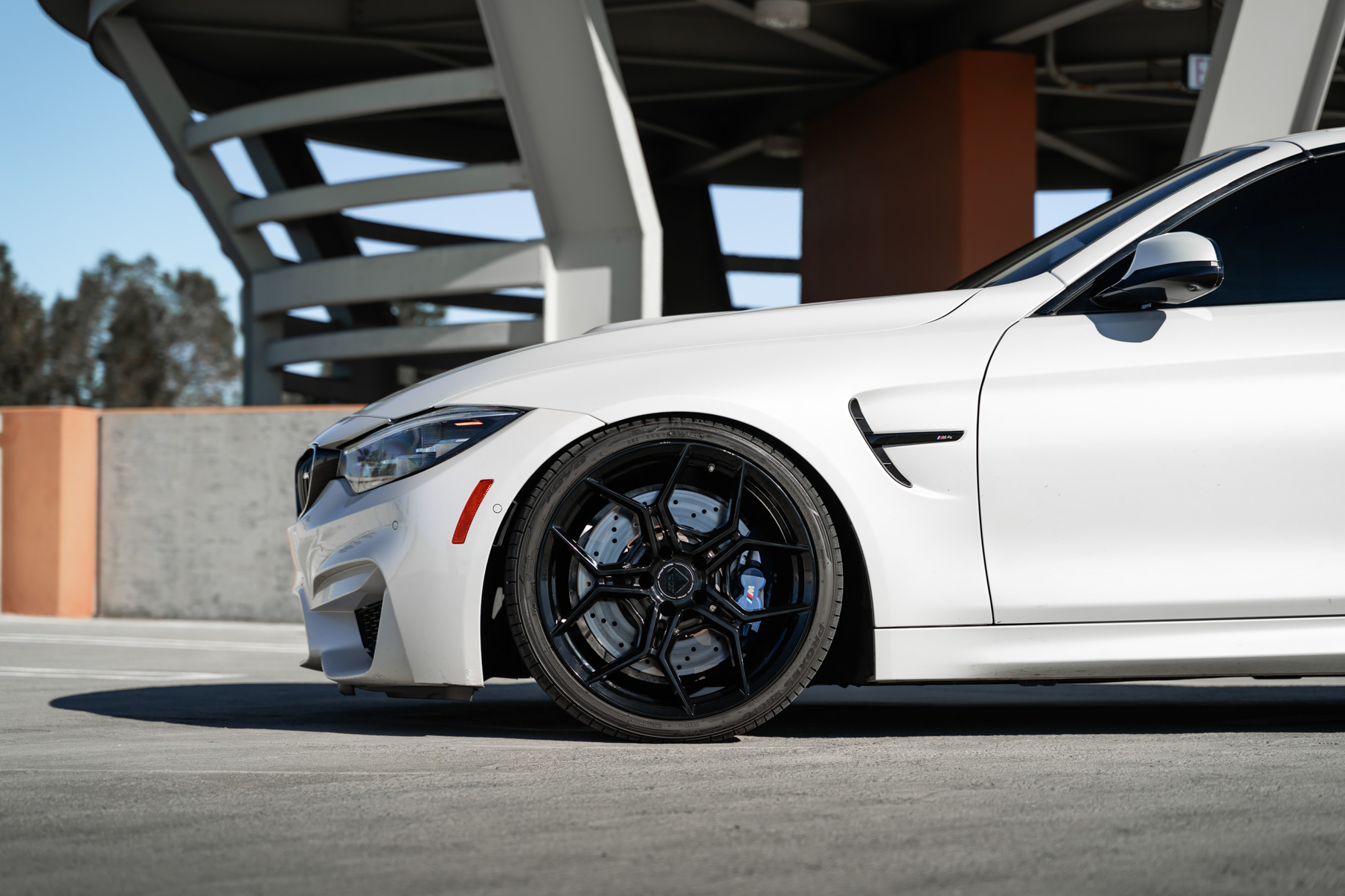 A 2018 BMW M4 on 20 Inch Blaque Diamond BD-F25 Gloss Black Wheels
