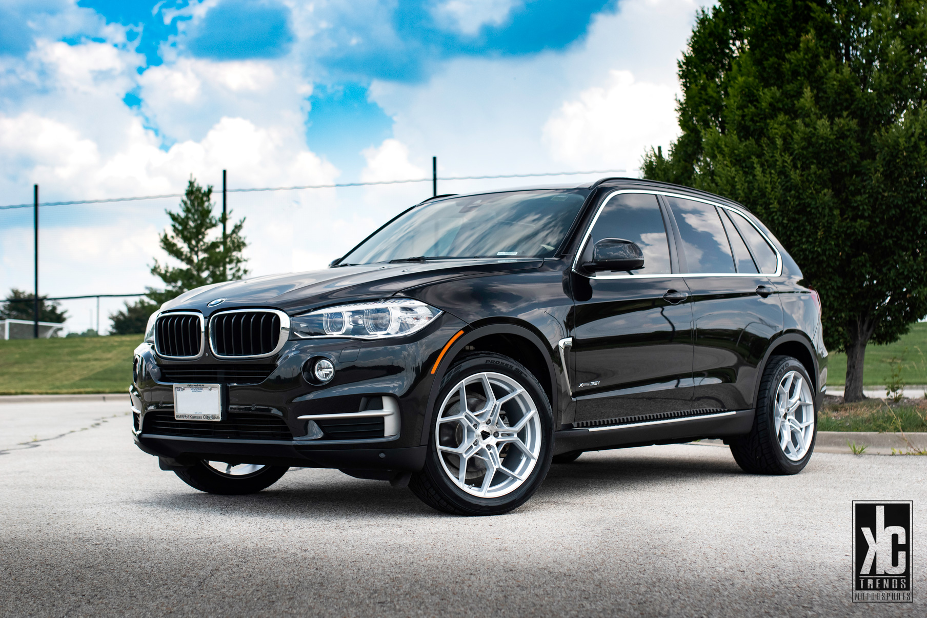 A 2015 BMW X5 on 20 Inch Blaque Diamond BD-F25 Brushed Silver Wheels