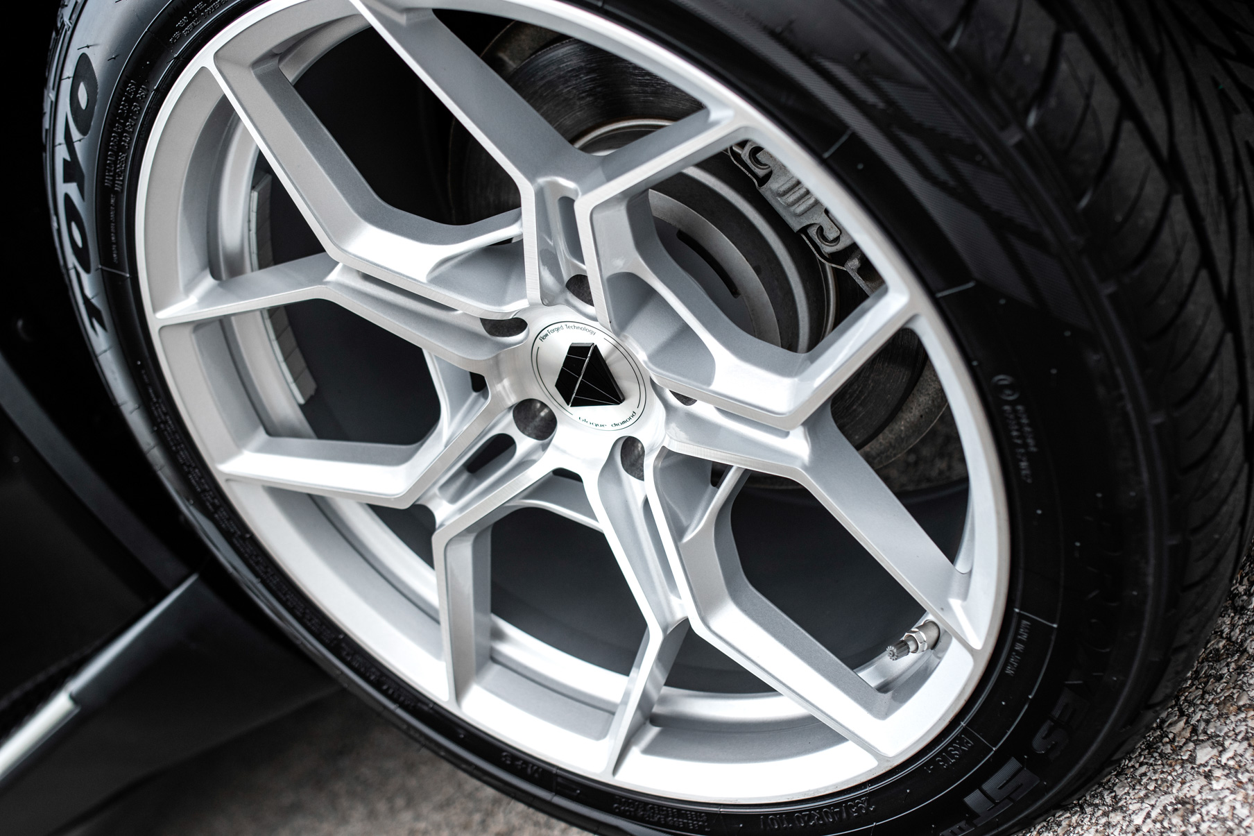 A 2015 BMW X5 on 20 Inch Blaque Diamond BD-F25 Brushed Silver Wheels