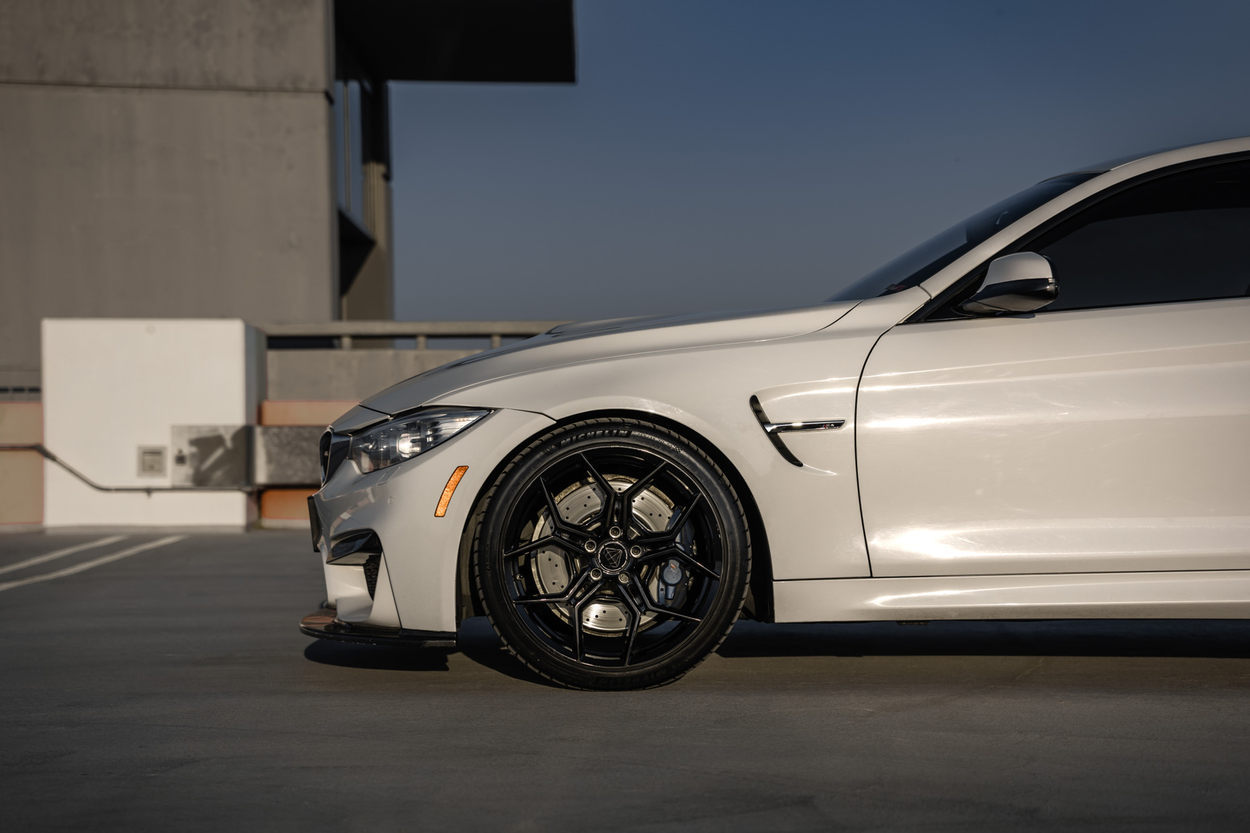 A 2015 BMW M4 on 20 Inch Blaque Diamond BD-F25 Gloss Black Wheels