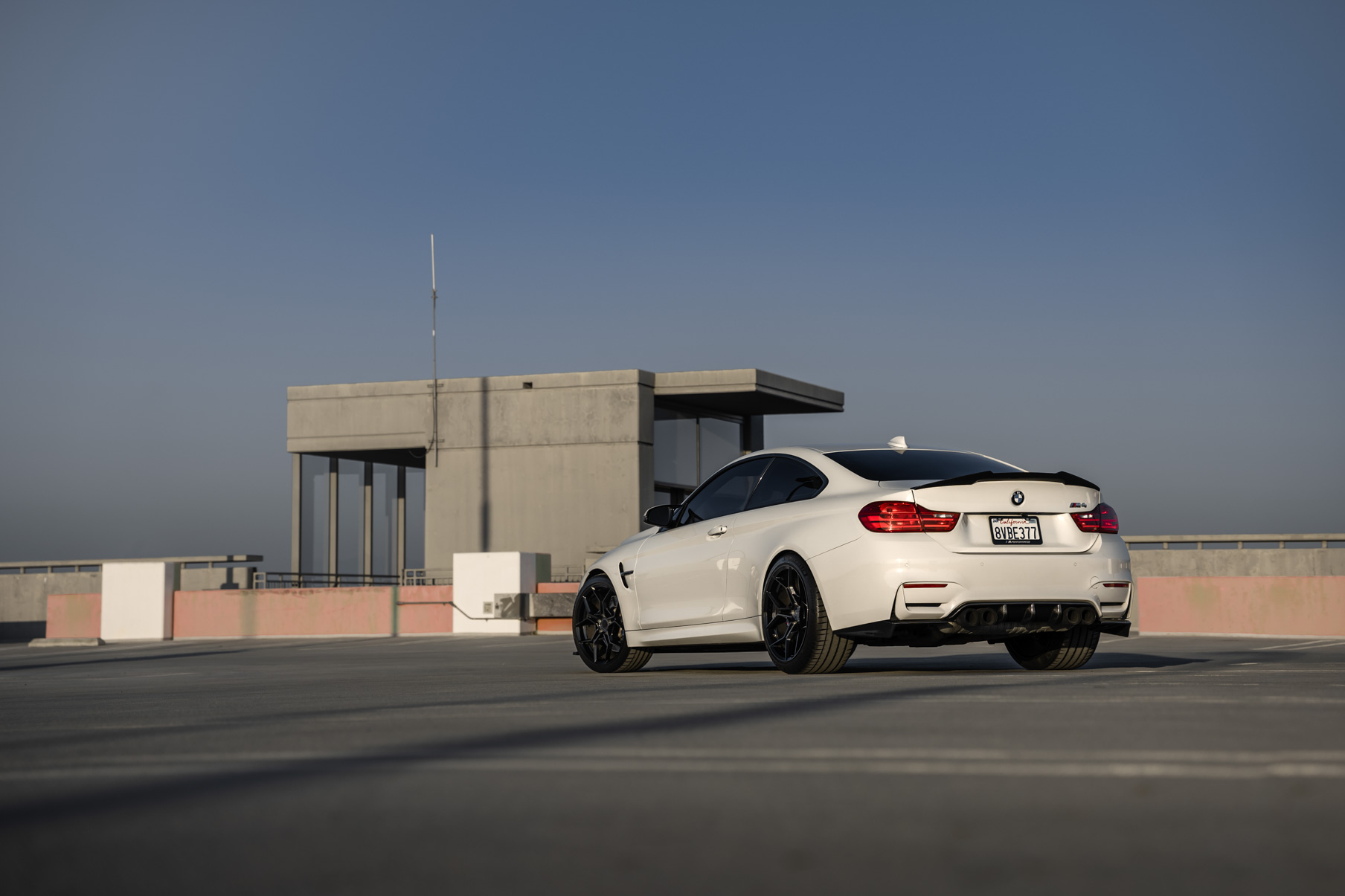 A 2015 BMW M4 on 20 Inch Blaque Diamond BD-F25 Gloss Black Wheels