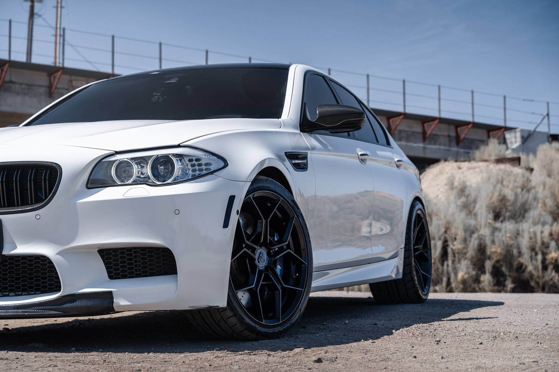 A 2013 BMW M5 on 20 Inch BD-F25 Gloss Black Wheels