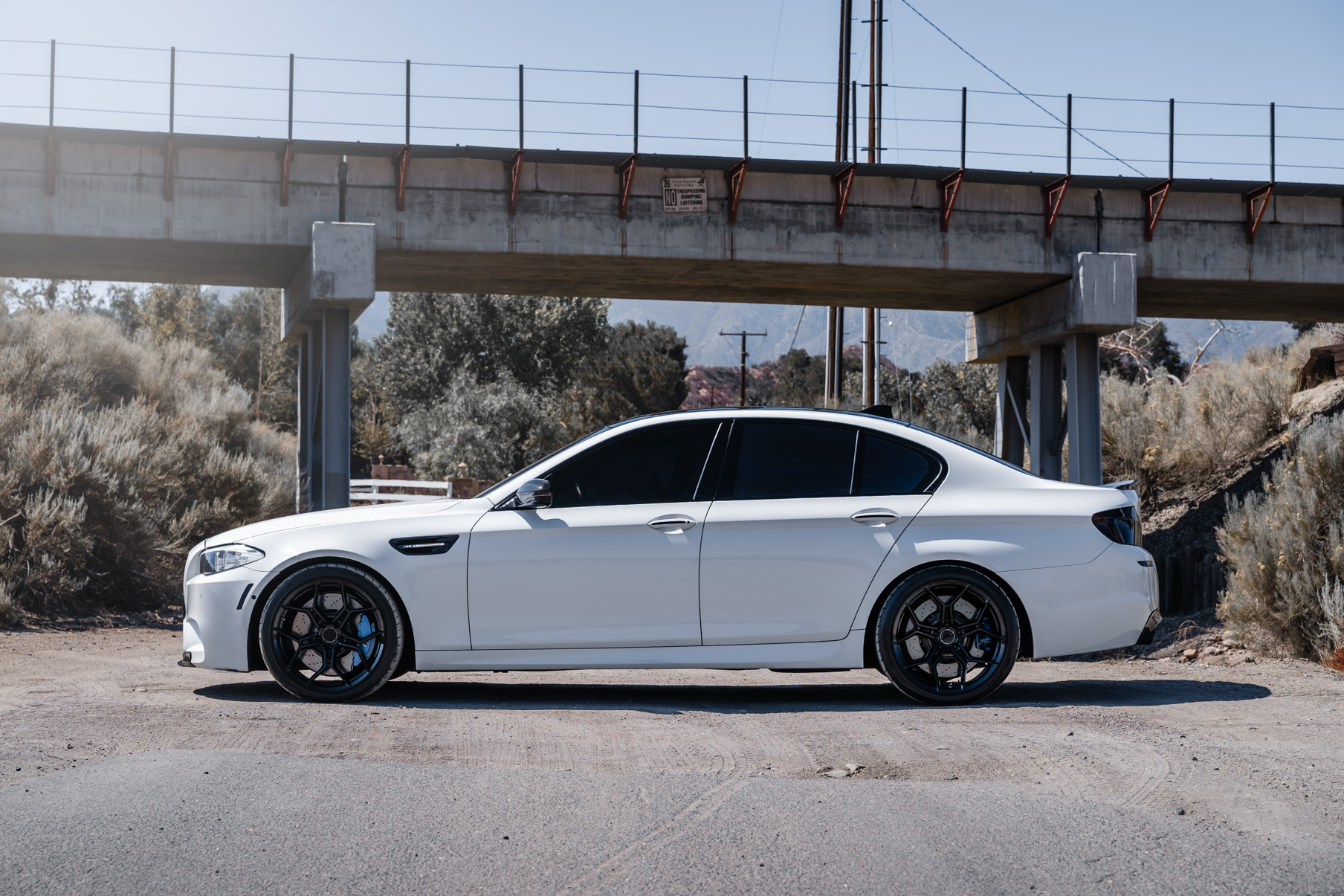 A 2013 BMW M5 on 20 Inch BD-F25 Gloss Black Wheels