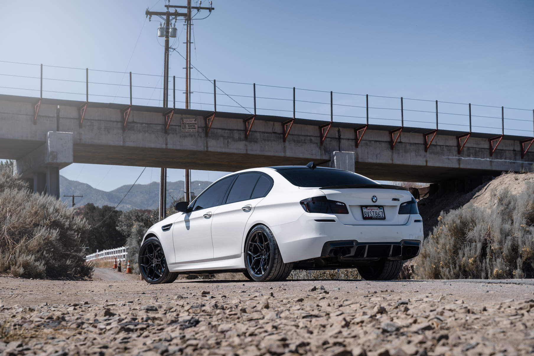 A 2013 BMW M5 on 20 Inch BD-F25 Gloss Black Wheels