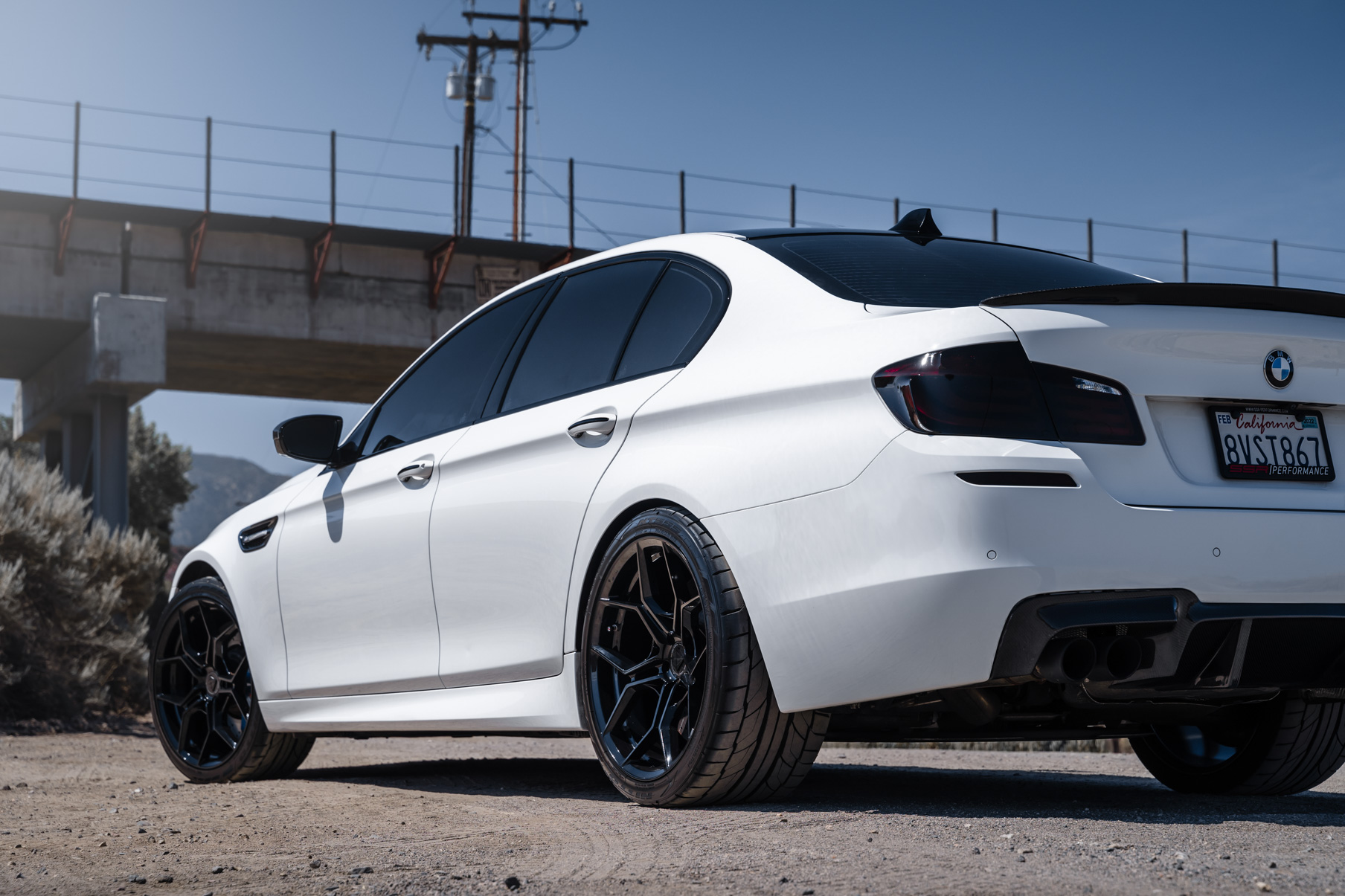 A 2013 BMW M5 on 20 Inch BD-F25 Gloss Black Wheels