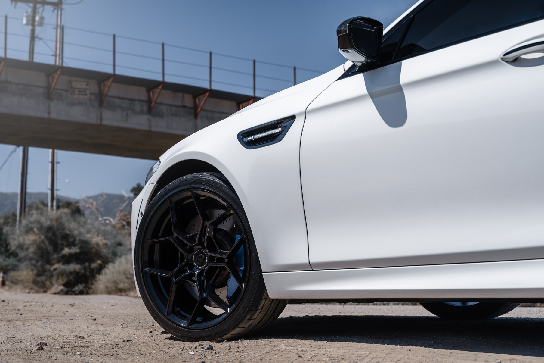 A 2013 BMW M5 on 20 Inch BD-F25 Gloss Black Wheels