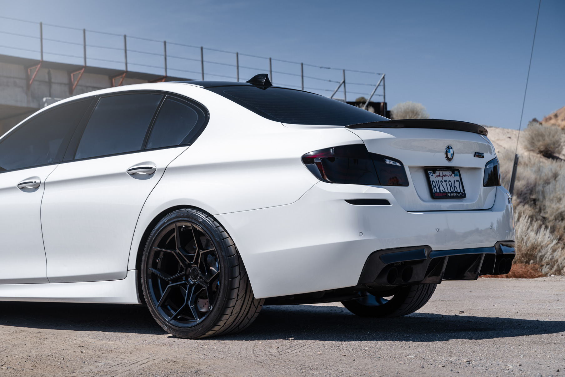 A 2013 BMW M5 on 20 Inch BD-F25 Gloss Black Wheels