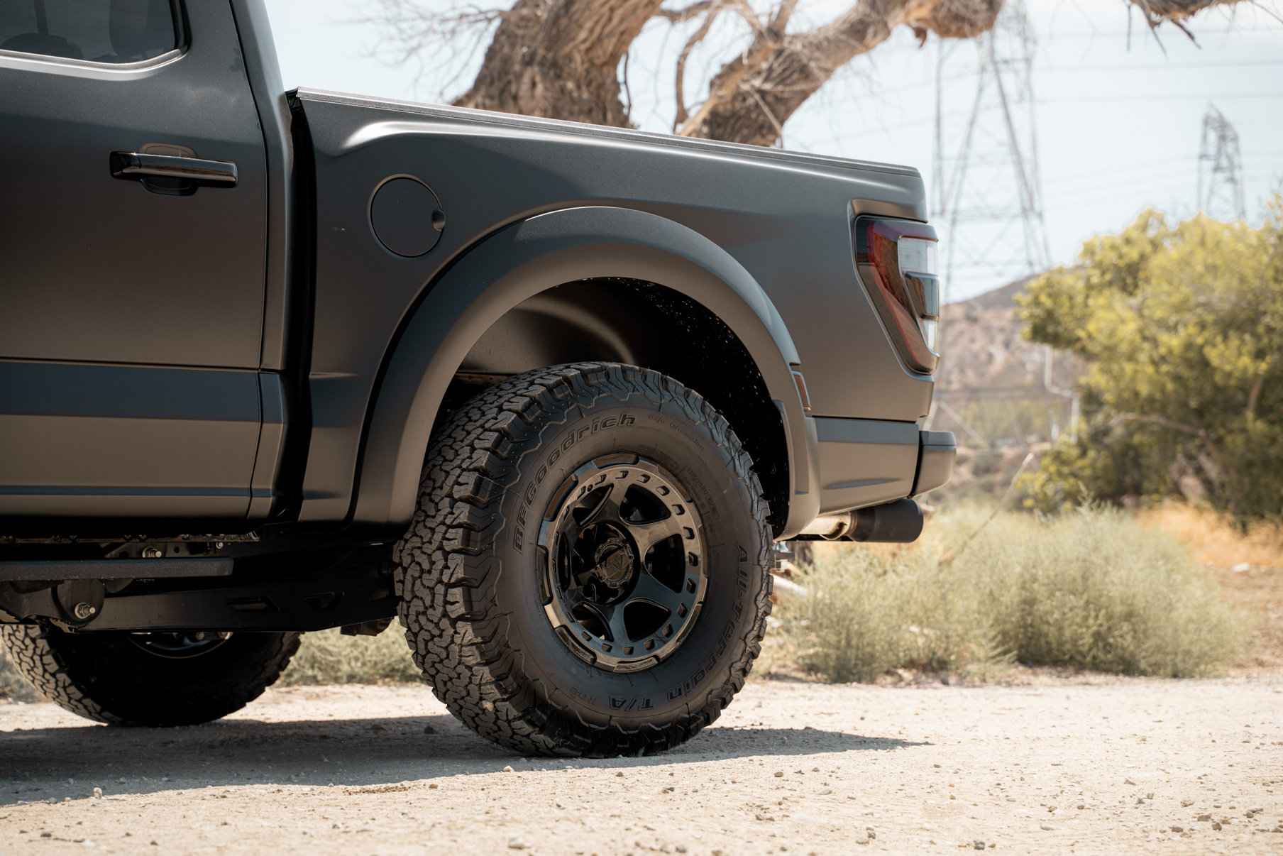 A 2022 Ford Raptor on Blaque Diamond BD-O728 Tinted Machined Black Wheels