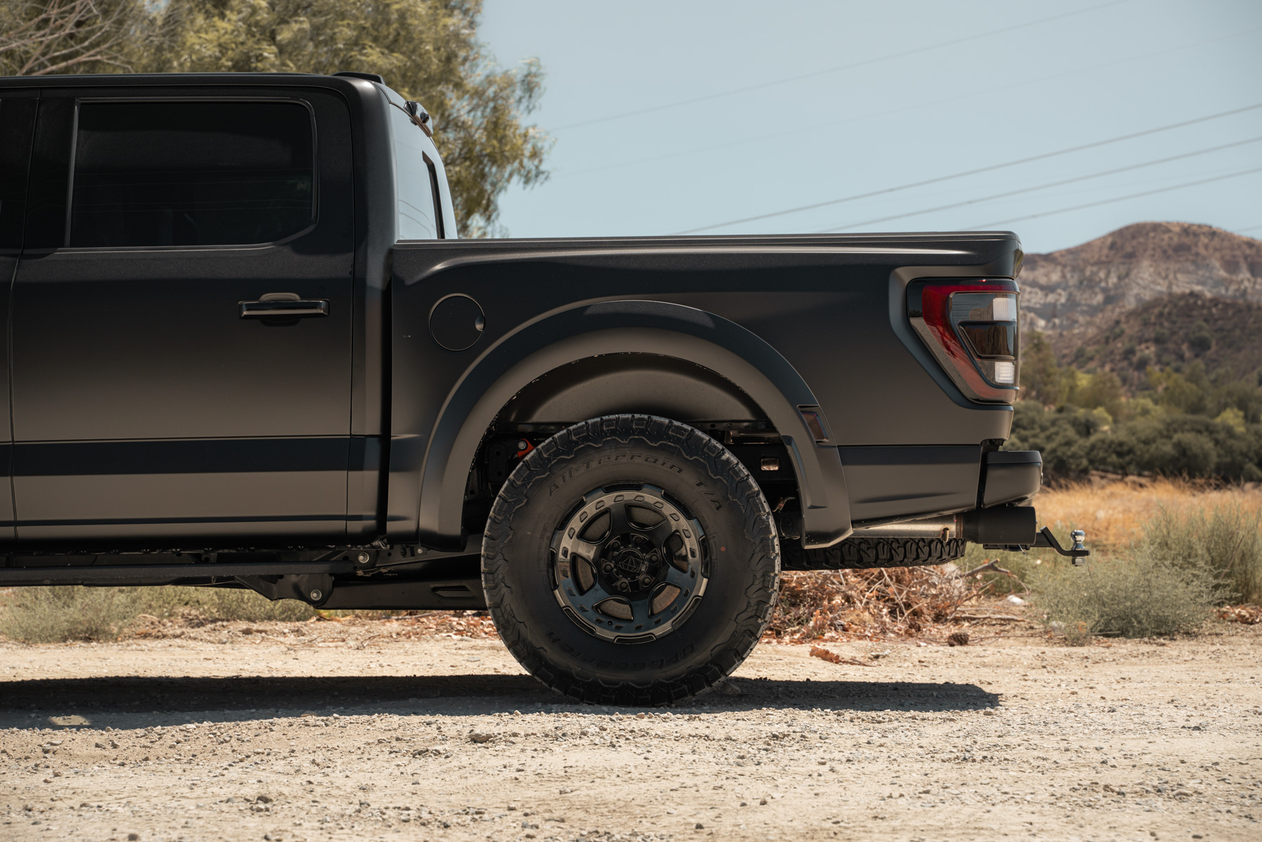 A 2022 Ford Raptor on Blaque Diamond BD-O728 Tinted Machined Black Wheels