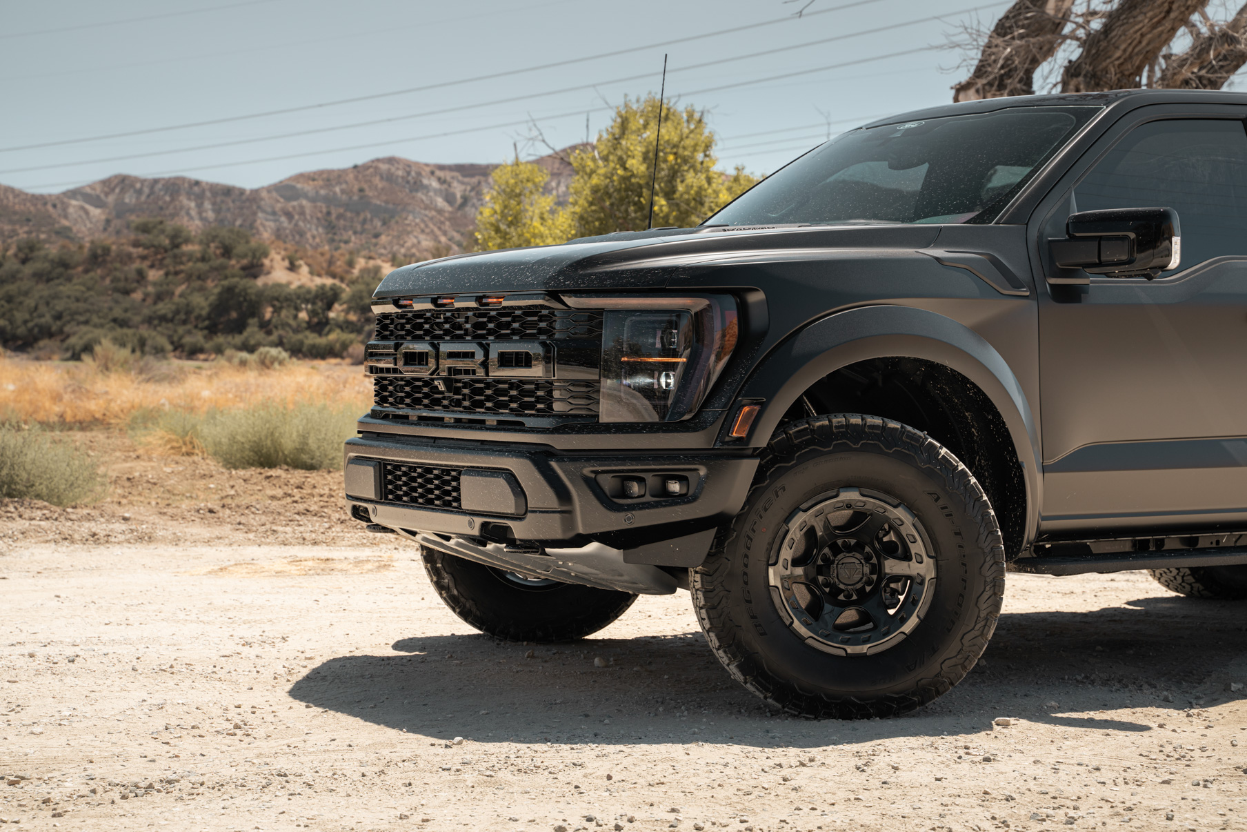 A 2022 Ford Raptor on Blaque Diamond BD-O728 Tinted Machined Black Wheels