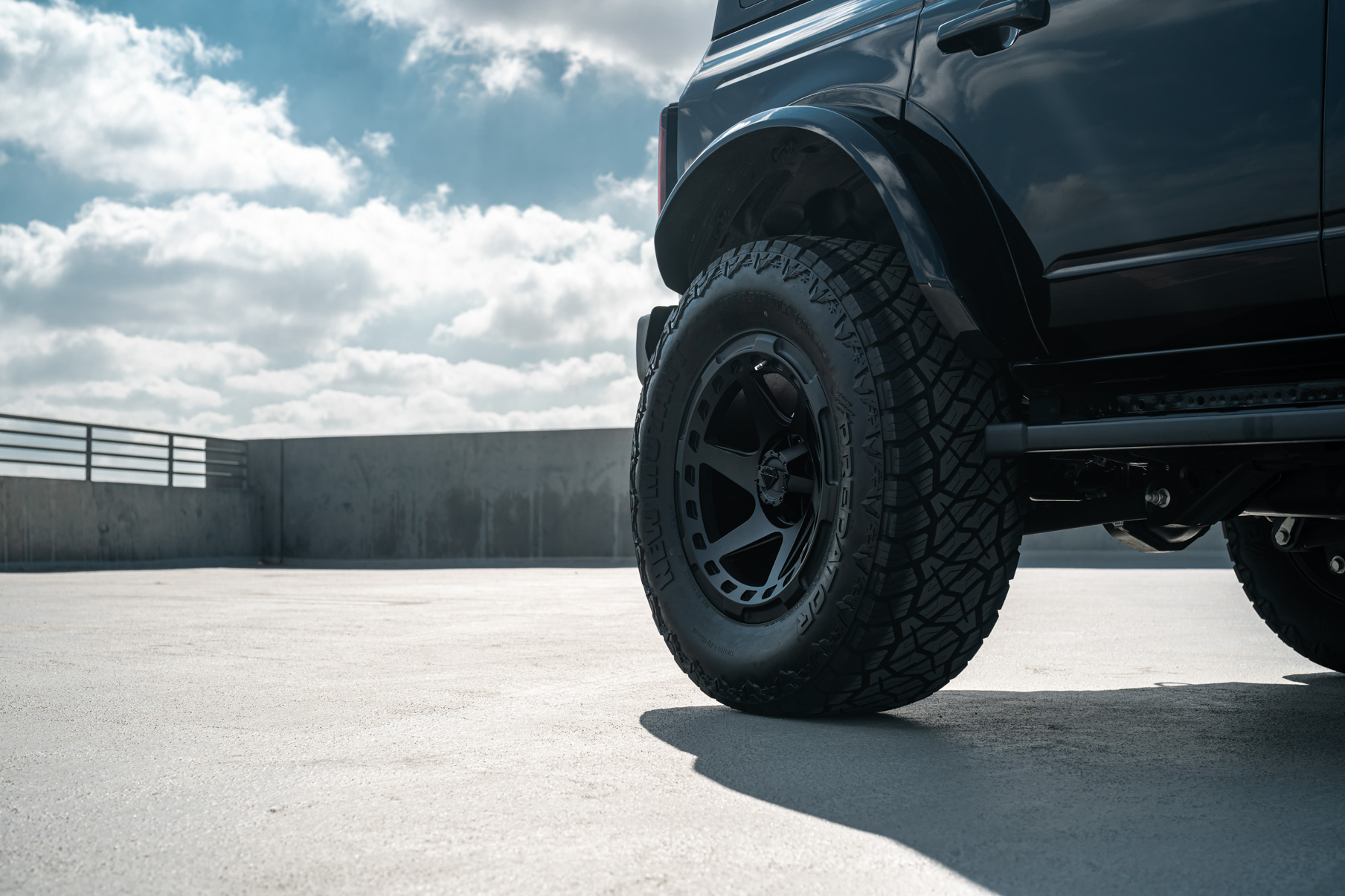 A 2022 Ford Bronco on Blaque Diamond BD-O728 Textured Black Wheels