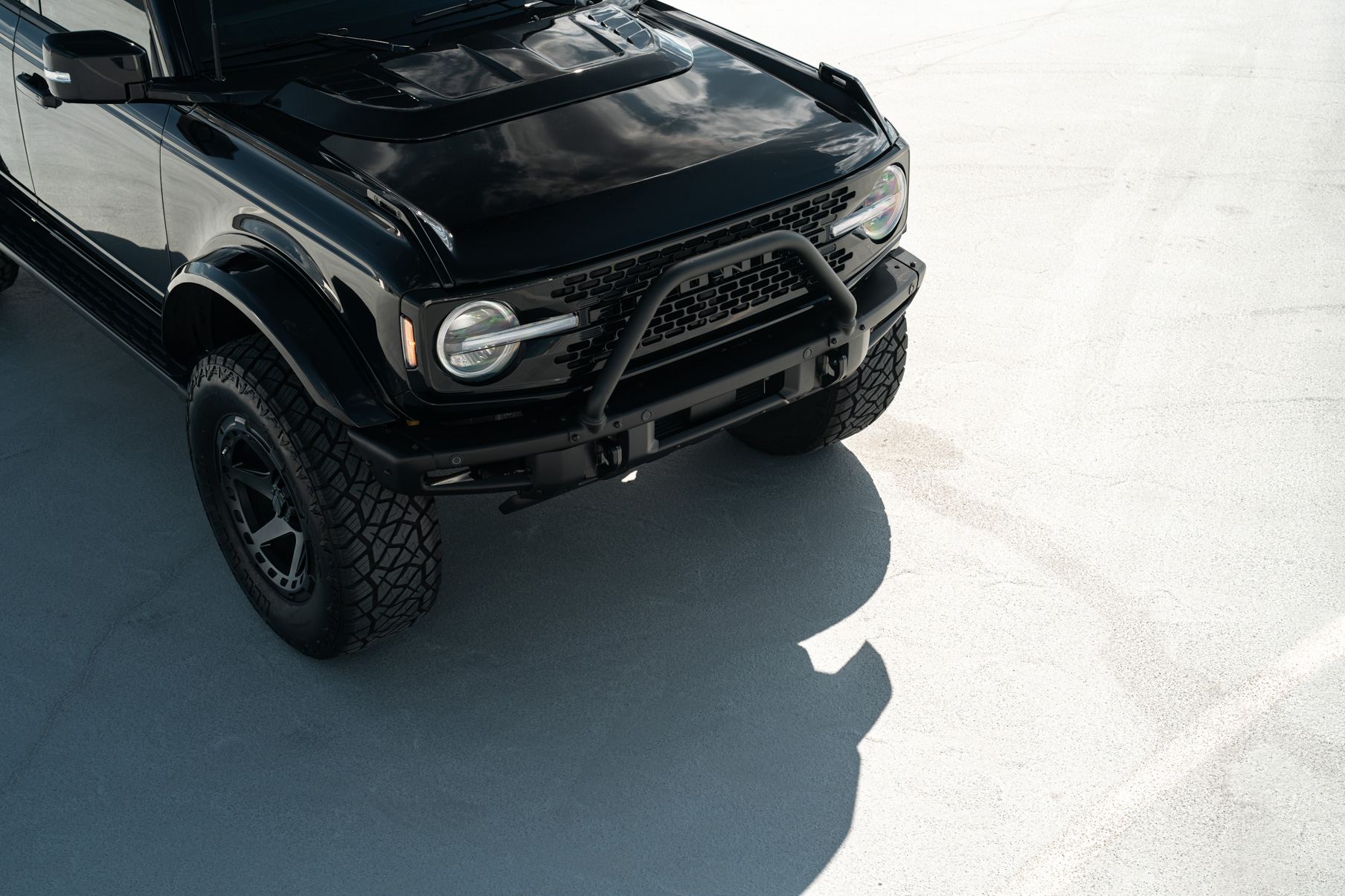 A 2022 Ford Bronco on Blaque Diamond BD-O728 Textured Black Wheels
