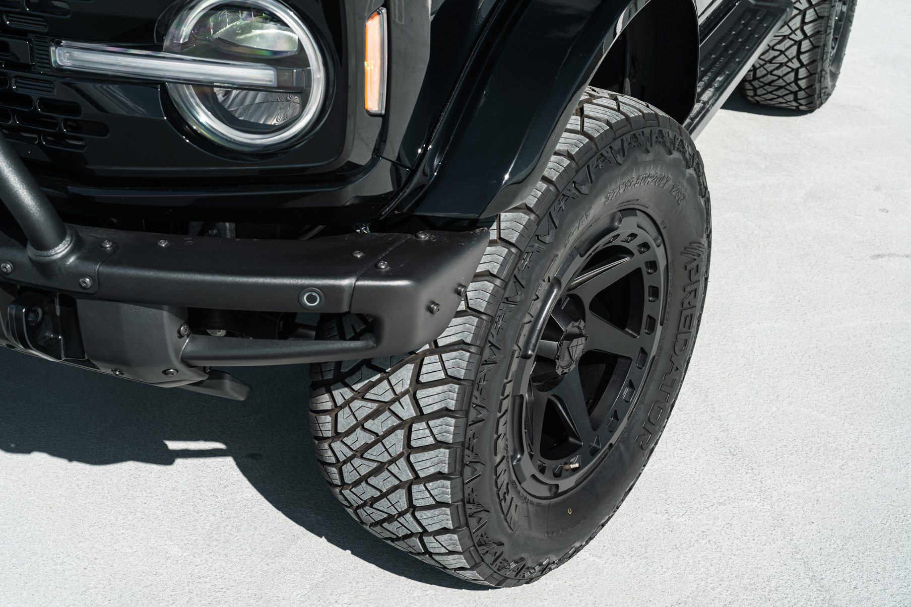 A 2022 Ford Bronco on Blaque Diamond BD-O728 Textured Black Wheels