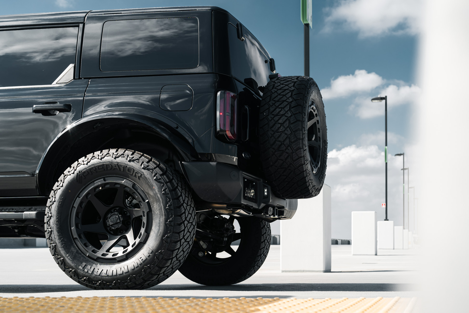 A 2022 Ford Bronco on Blaque Diamond BD-O728 Textured Black Wheels