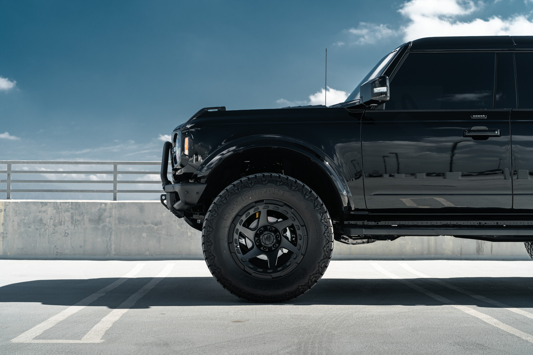 A 2022 Ford Bronco on Blaque Diamond BD-O728 Textured Black Wheels