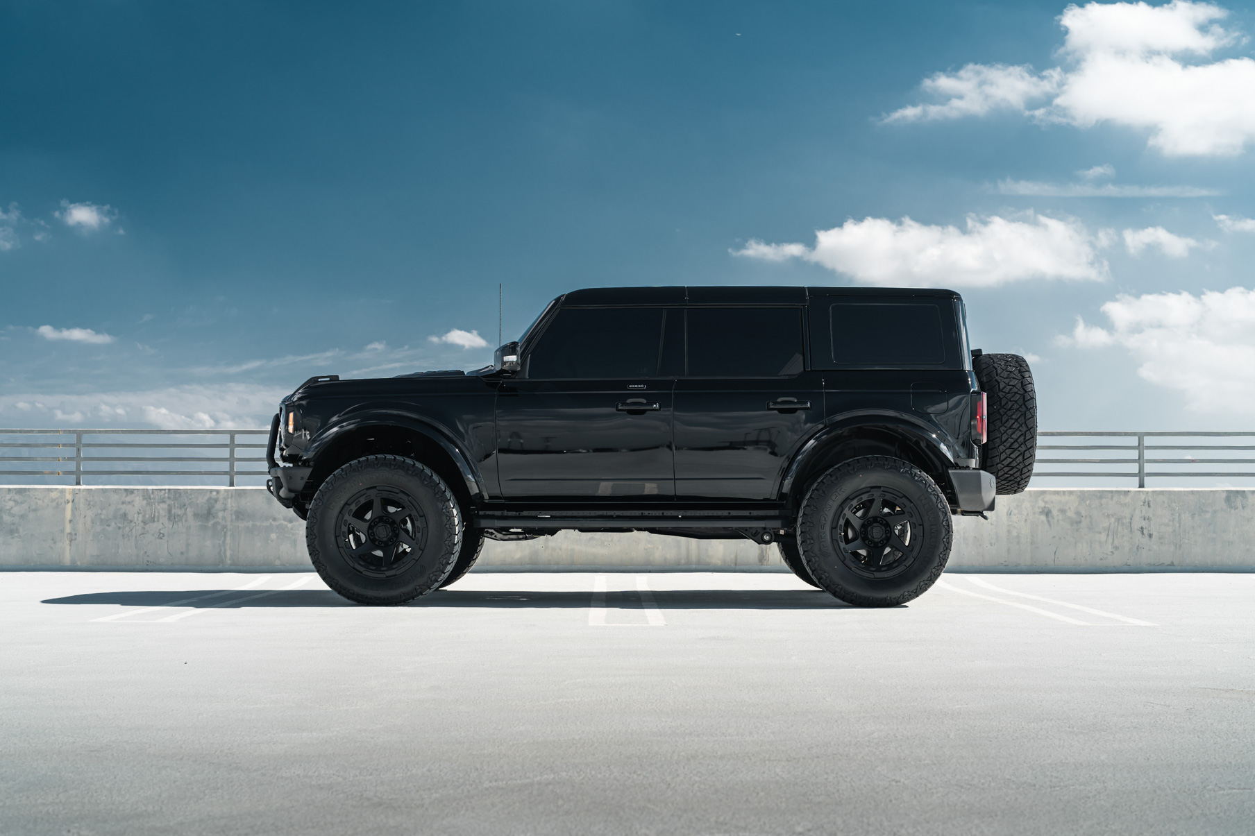 A 2022 Ford Bronco on Blaque Diamond BD-O728 Textured Black Wheels
