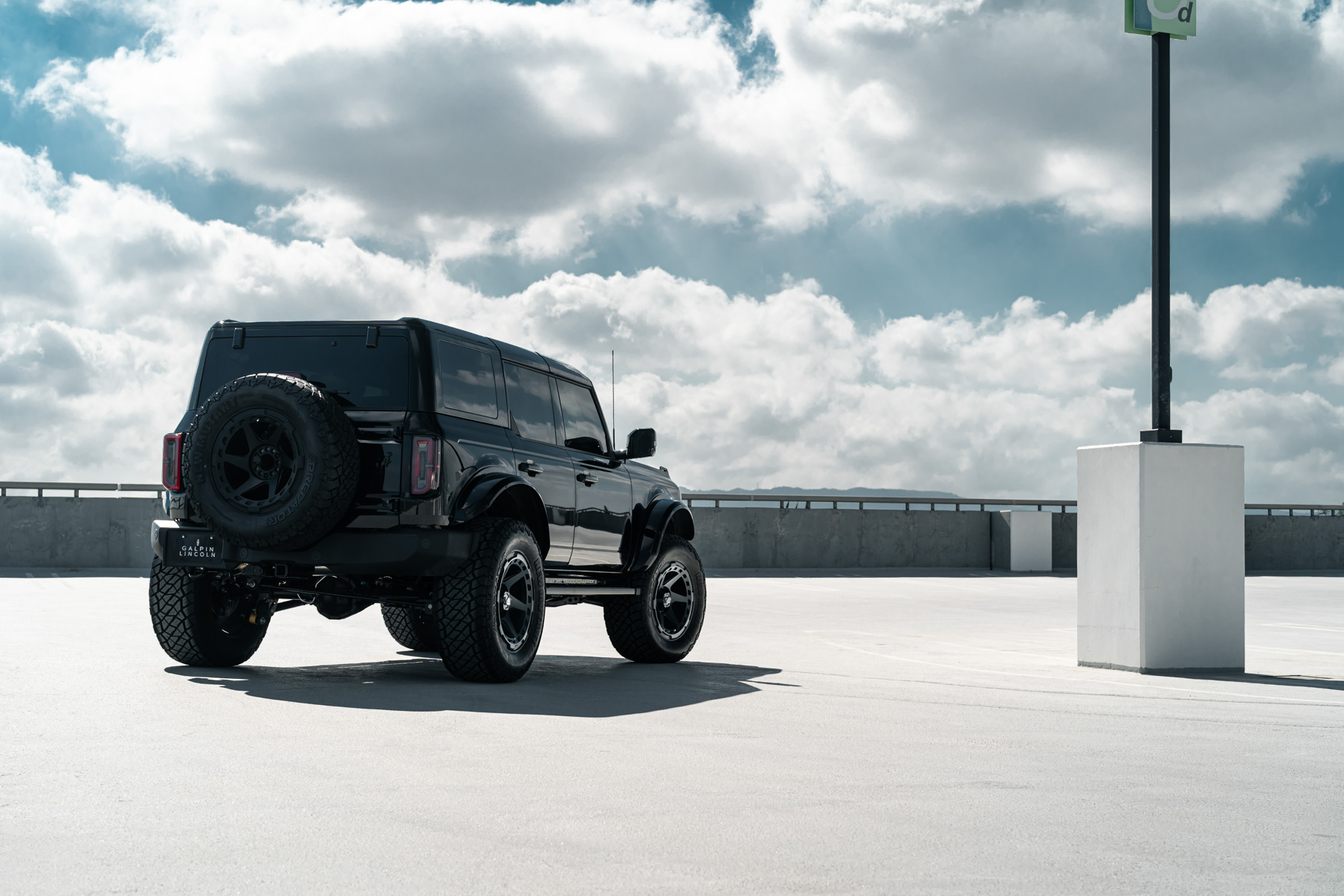 A 2022 Ford Bronco on Blaque Diamond BD-O728 Textured Black Wheels