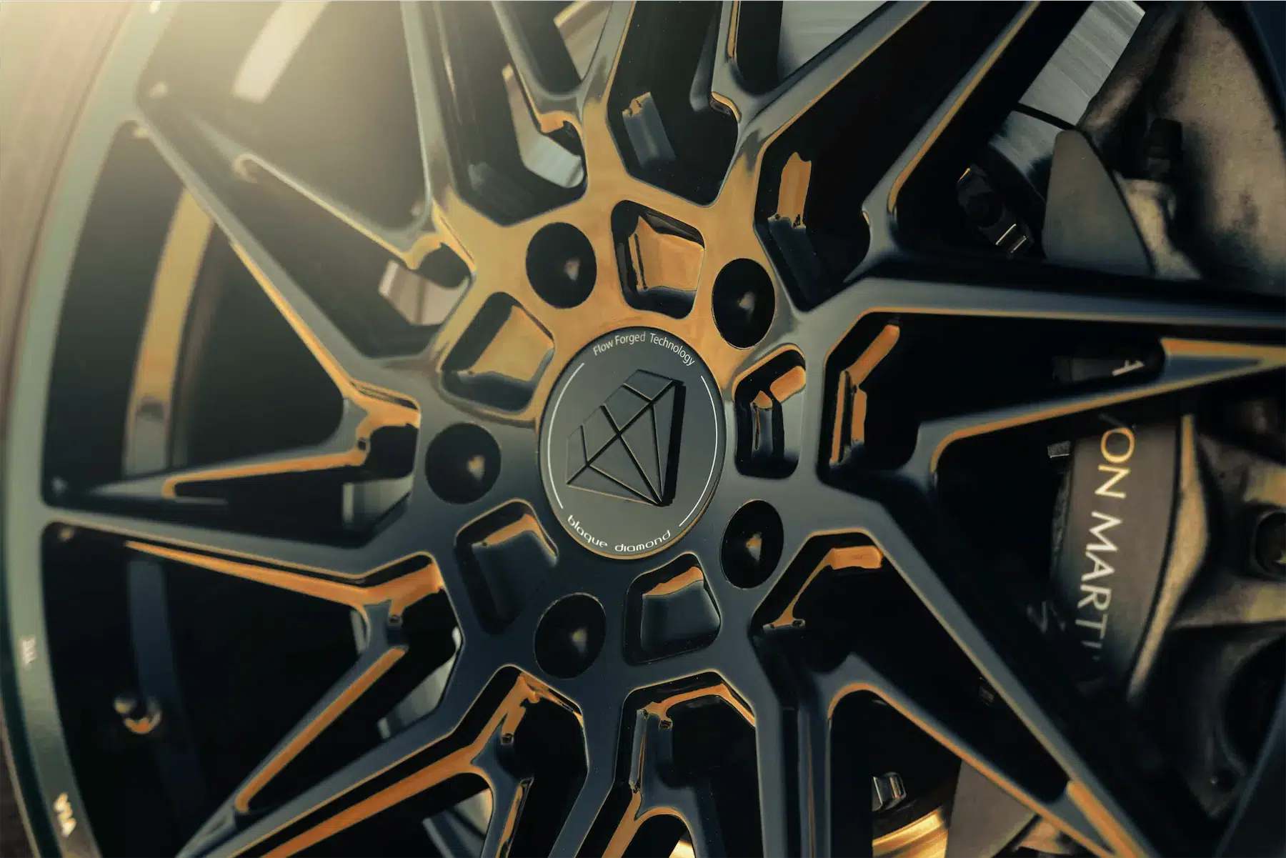 A 2020 Aston Martin Vantage on 20 Inch Blaque Diamond BD-F20 Gloss Black Wheels