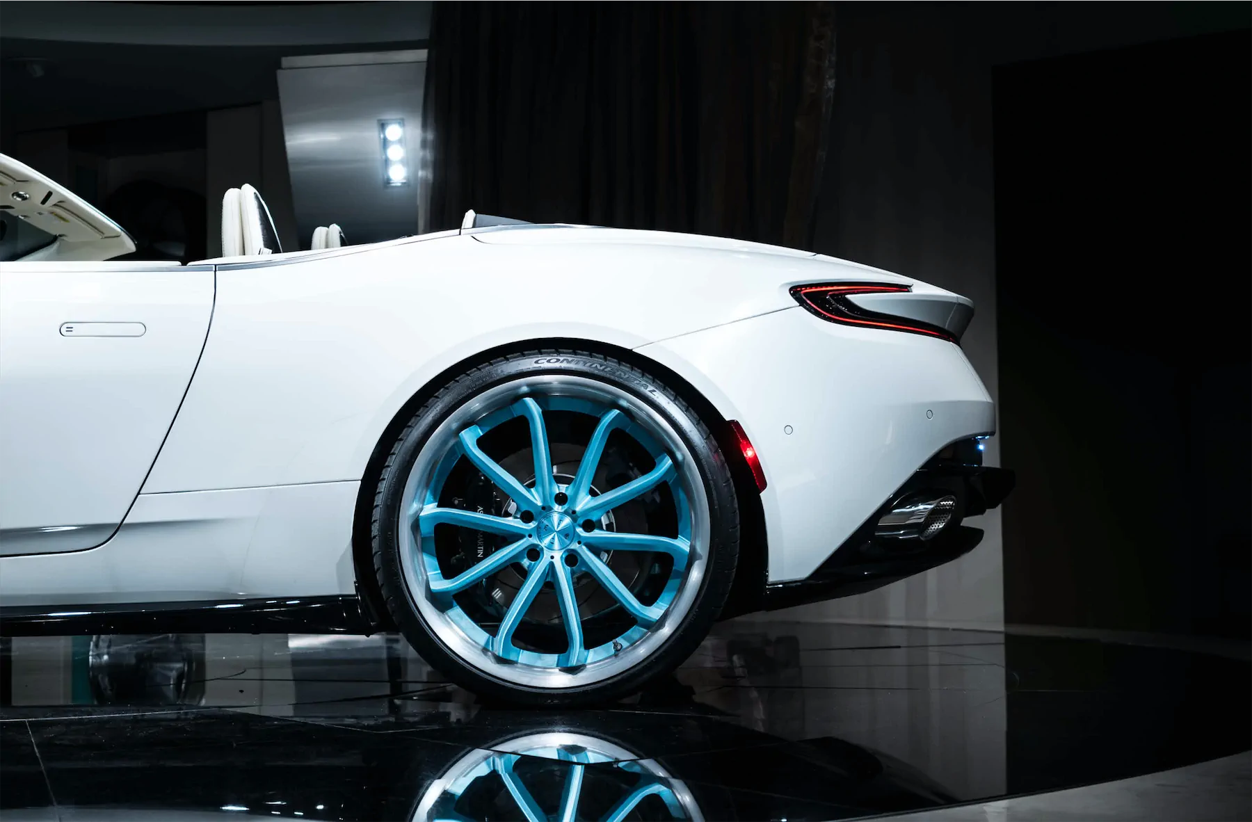 A 2017 Aston Martin DB11 on 20 Inch Blaque Diamond BD-23 Brushed Baby Blue Wheels