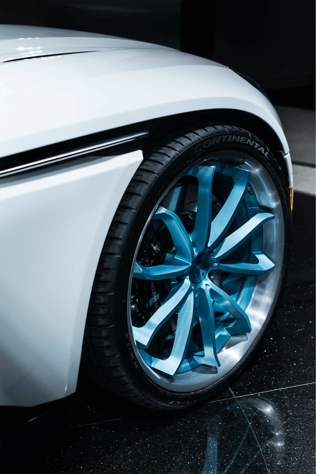 A 2017 Aston Martin DB11 on 20 Inch Blaque Diamond BD-23 Brushed Baby Blue Wheels