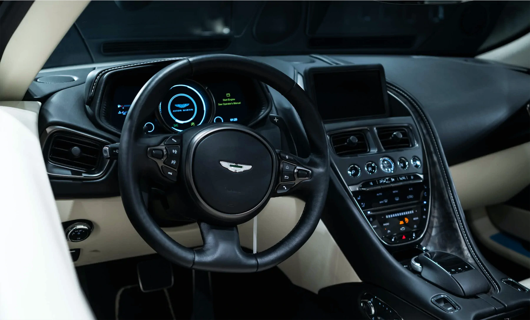 A 2017 Aston Martin DB11 on 20 Inch Blaque Diamond BD-23 Brushed Baby Blue Wheels