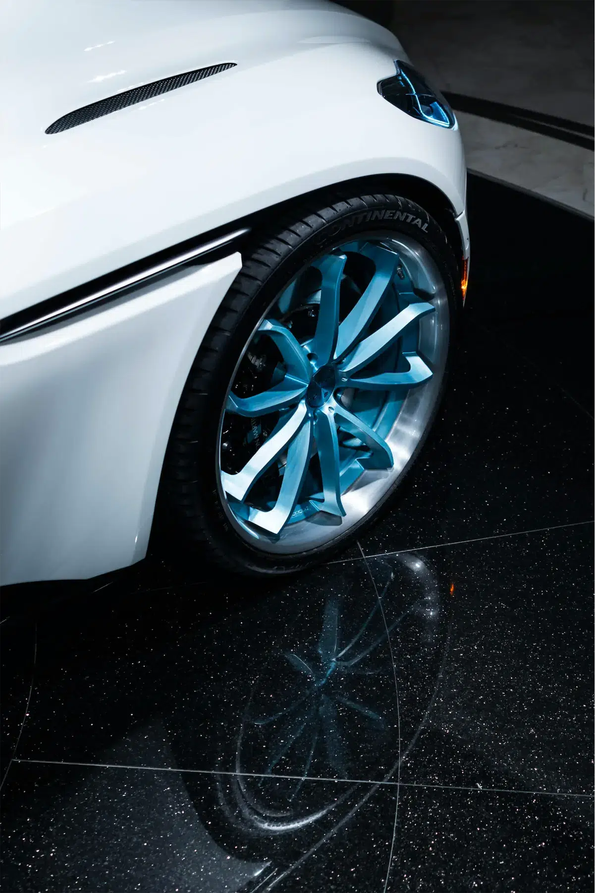 A 2017 Aston Martin DB11 on 20 Inch Blaque Diamond BD-23 Brushed Baby Blue Wheels