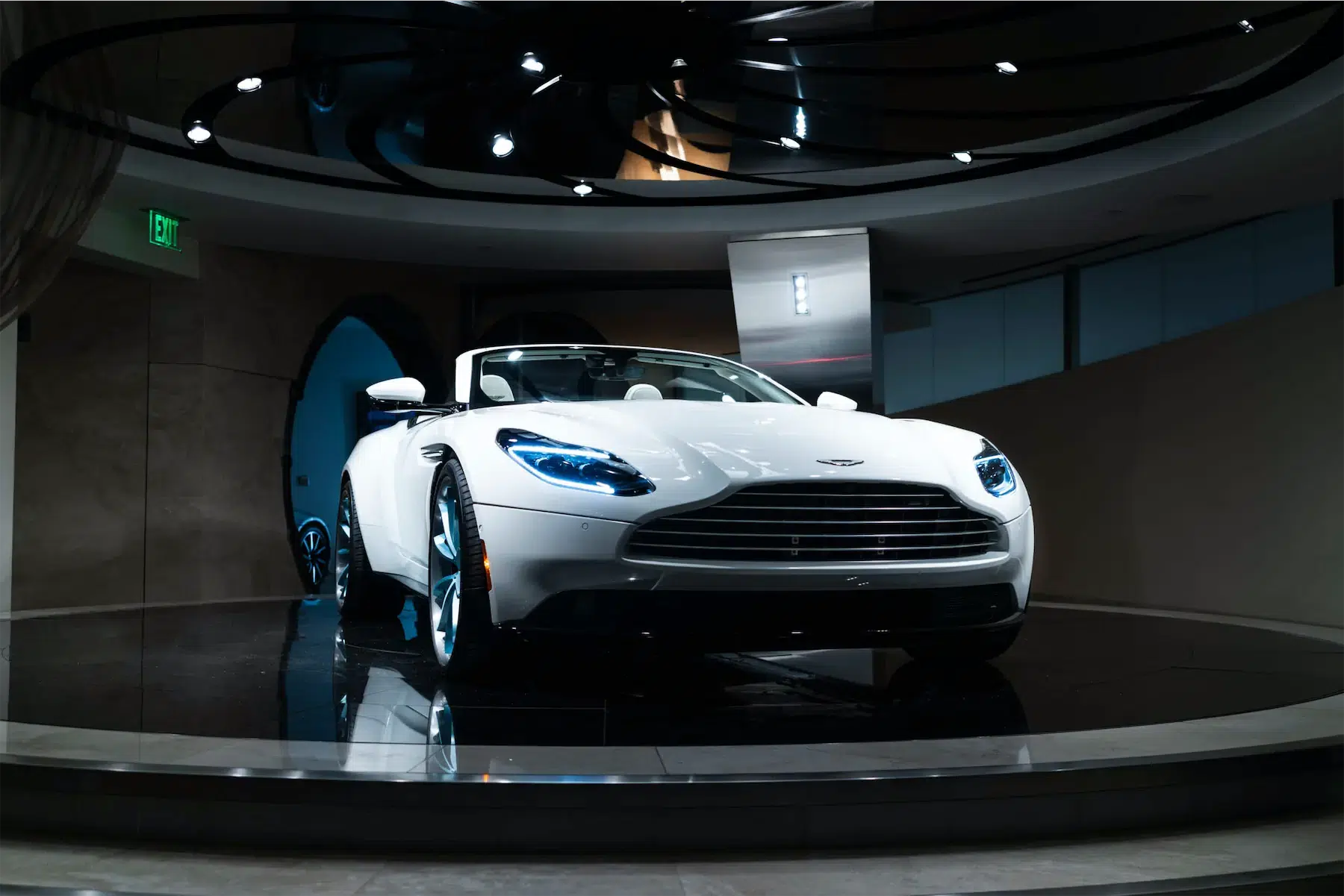 A 2017 Aston Martin DB11 on 20 Inch Blaque Diamond BD-23 Brushed Baby Blue Wheels