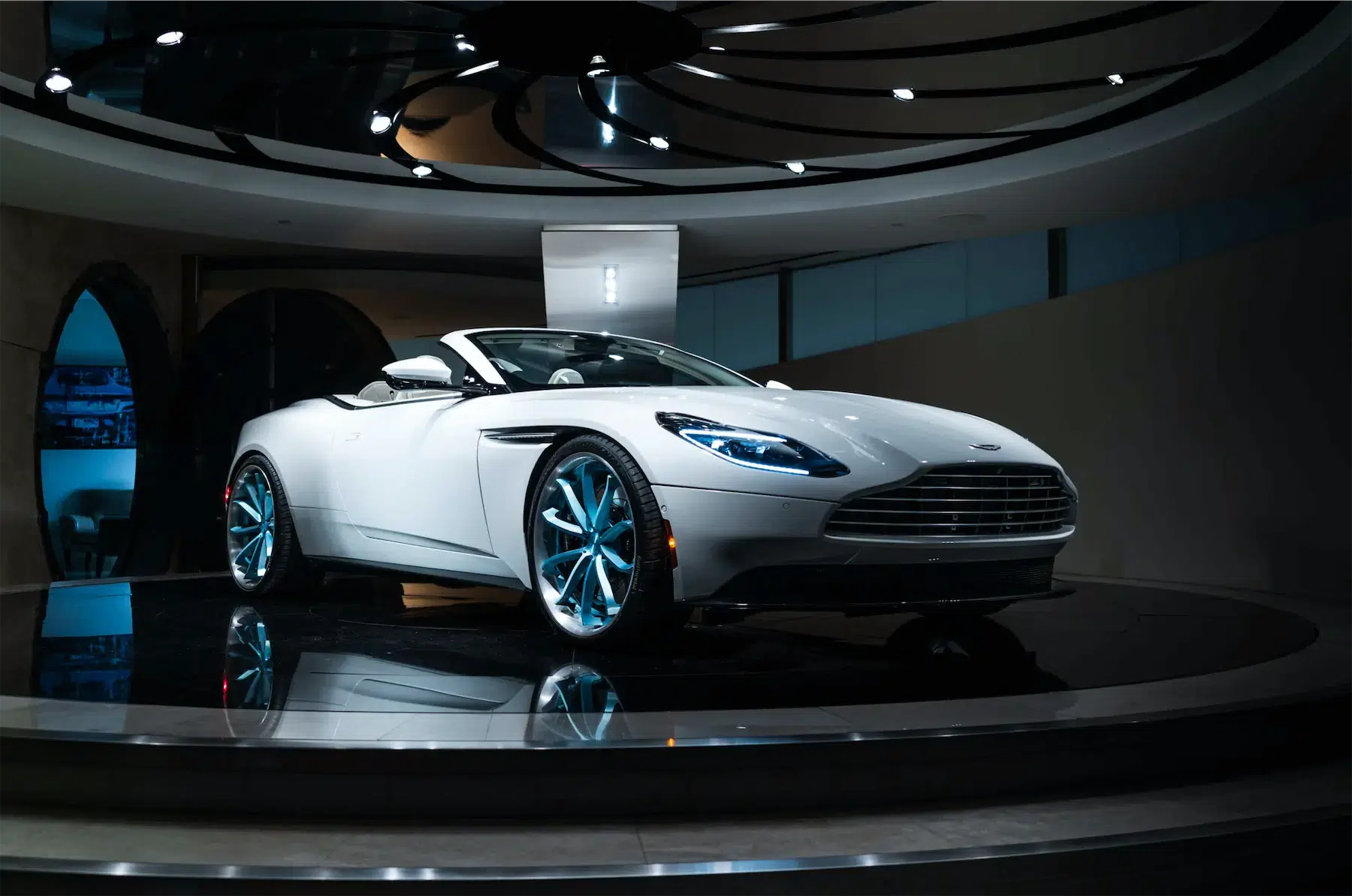 A 2017 Aston Martin DB11 on 20 Inch Blaque Diamond BD-23 Brushed Baby Blue Wheels