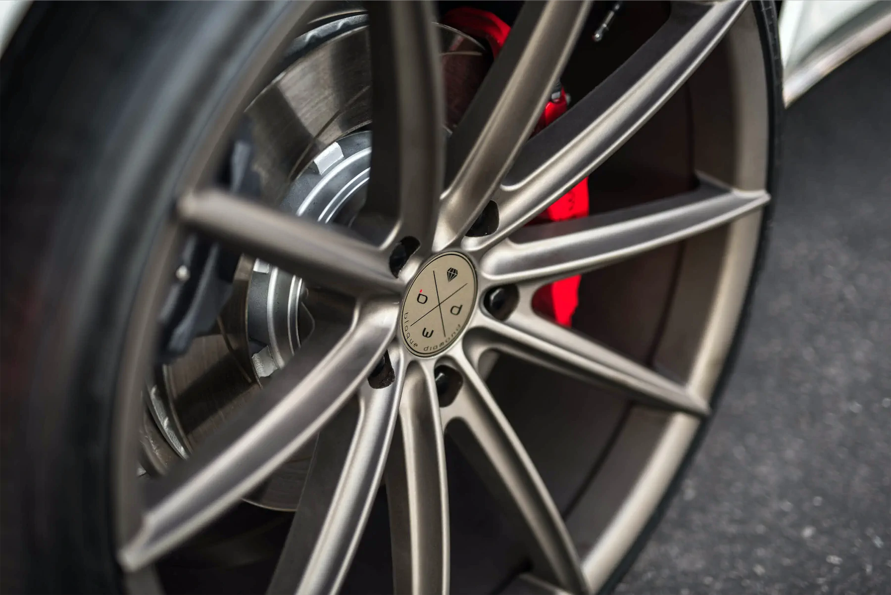 A 2017 Aston Martin DB11 on 22 Inch Blaque Diamond BD-11 Matte Antique Bronze Wheels