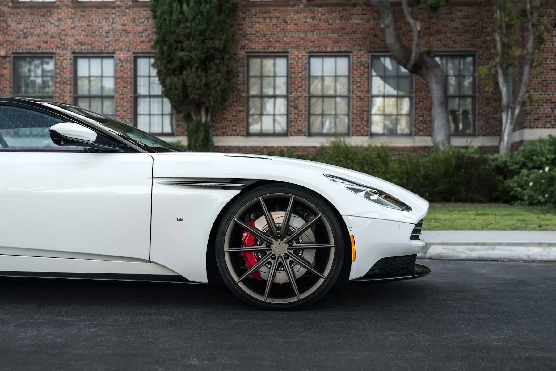 A 2017 Aston Martin DB11 on 22 Inch Blaque Diamond BD-11 Matte Antique Bronze Wheels
