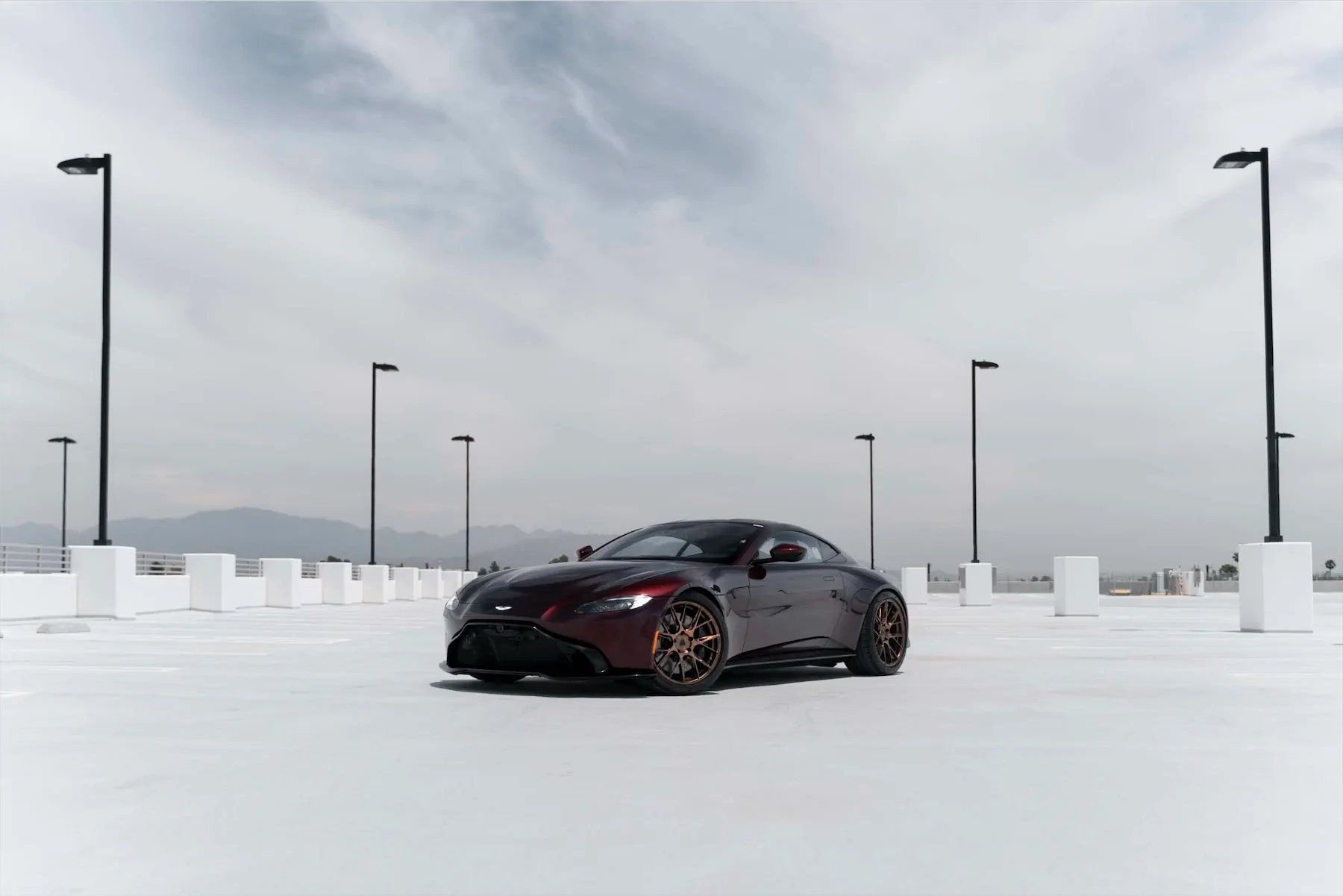 A 2020 Aston Martin Vantage on Blaque Diamond BD-F18 Liquid Polished Bronze Wheels