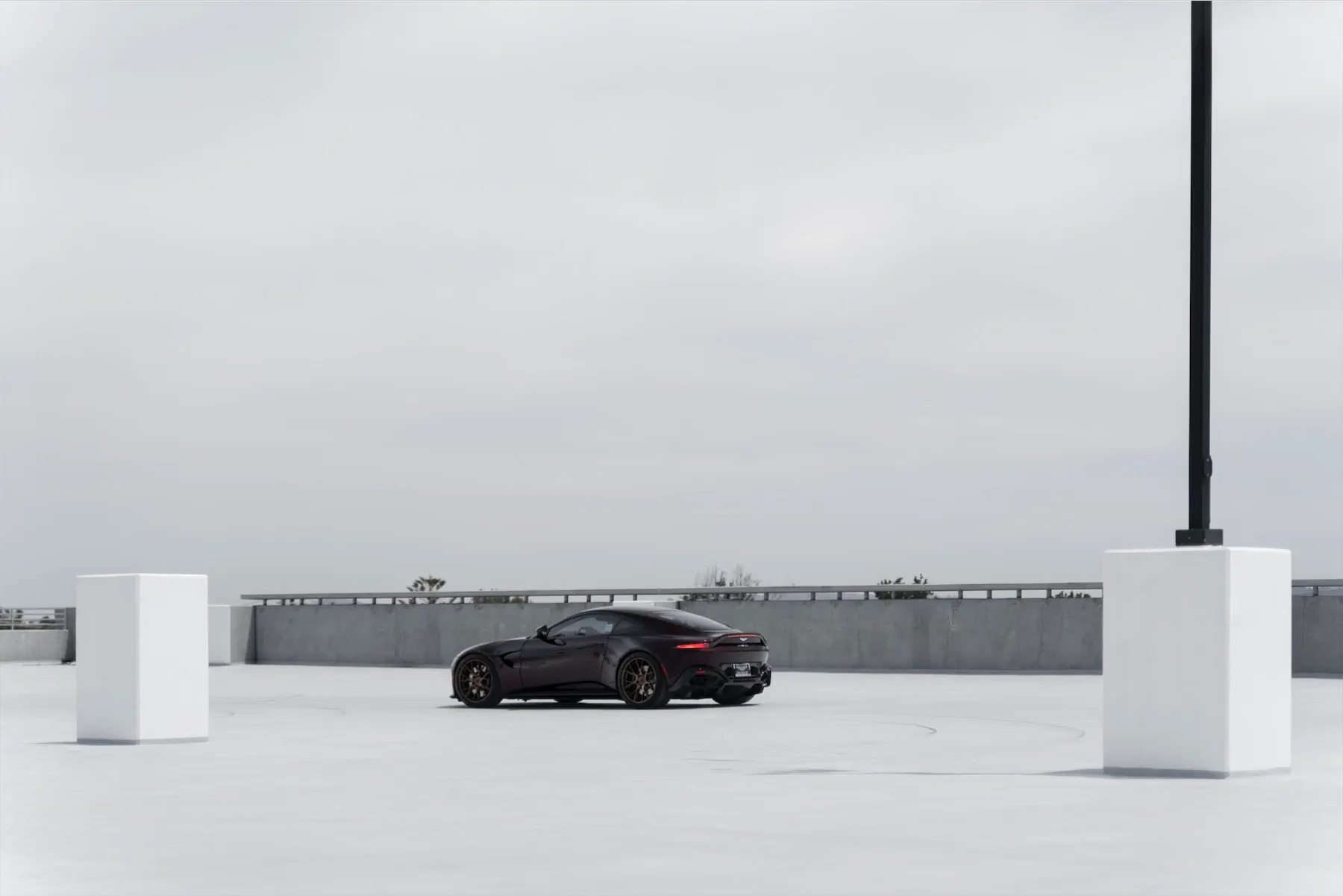 A 2020 Aston Martin Vantage on Blaque Diamond BD-F18 Liquid Polished Bronze Wheels