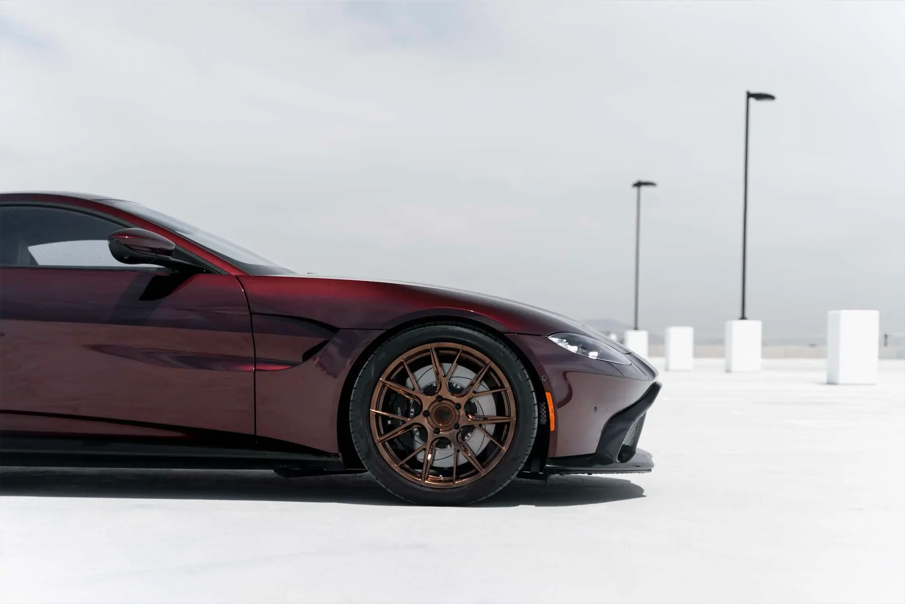 A 2020 Aston Martin Vantage on Blaque Diamond BD-F18 Liquid Polished Bronze Wheels
