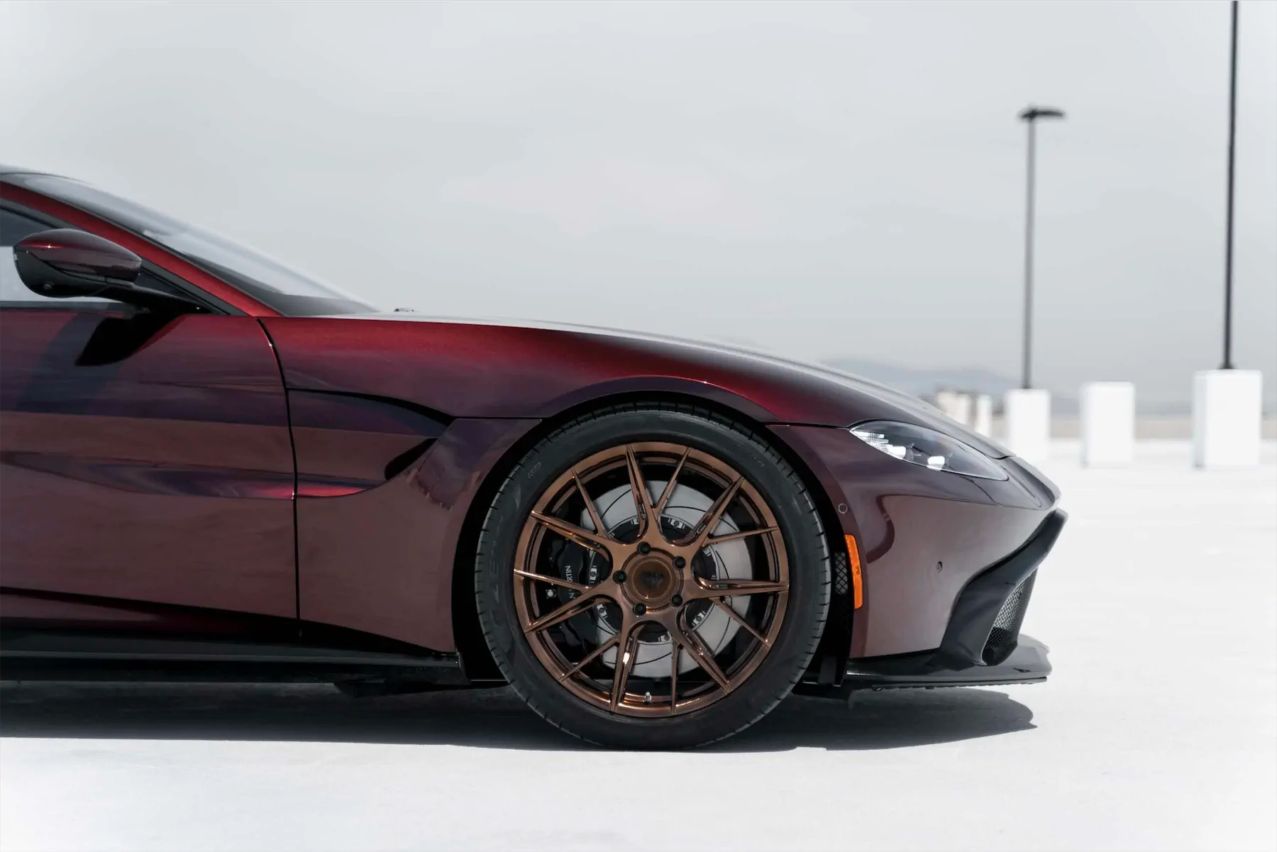 A 2020 Aston Martin Vantage on Blaque Diamond BD-F18 Liquid Polished Bronze Wheels