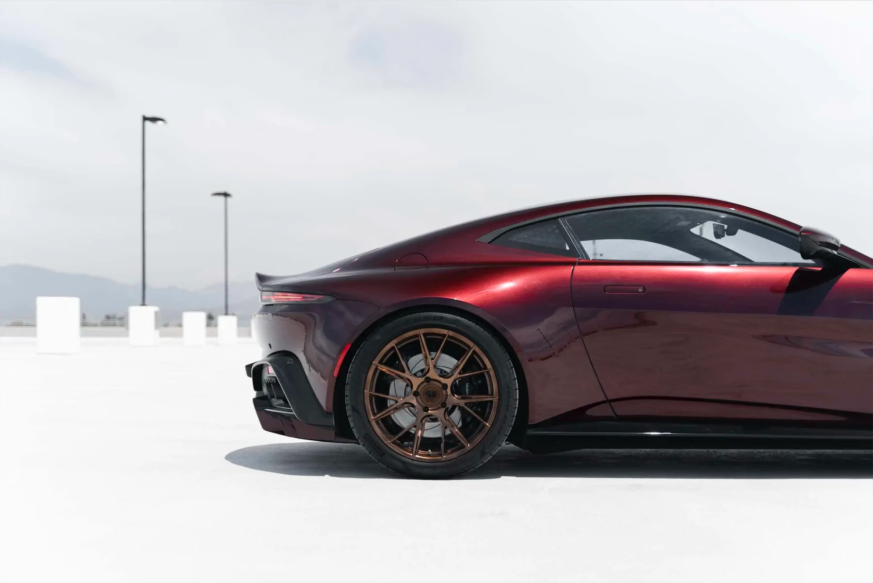 A 2020 Aston Martin Vantage on Blaque Diamond BD-F18 Liquid Polished Bronze Wheels
