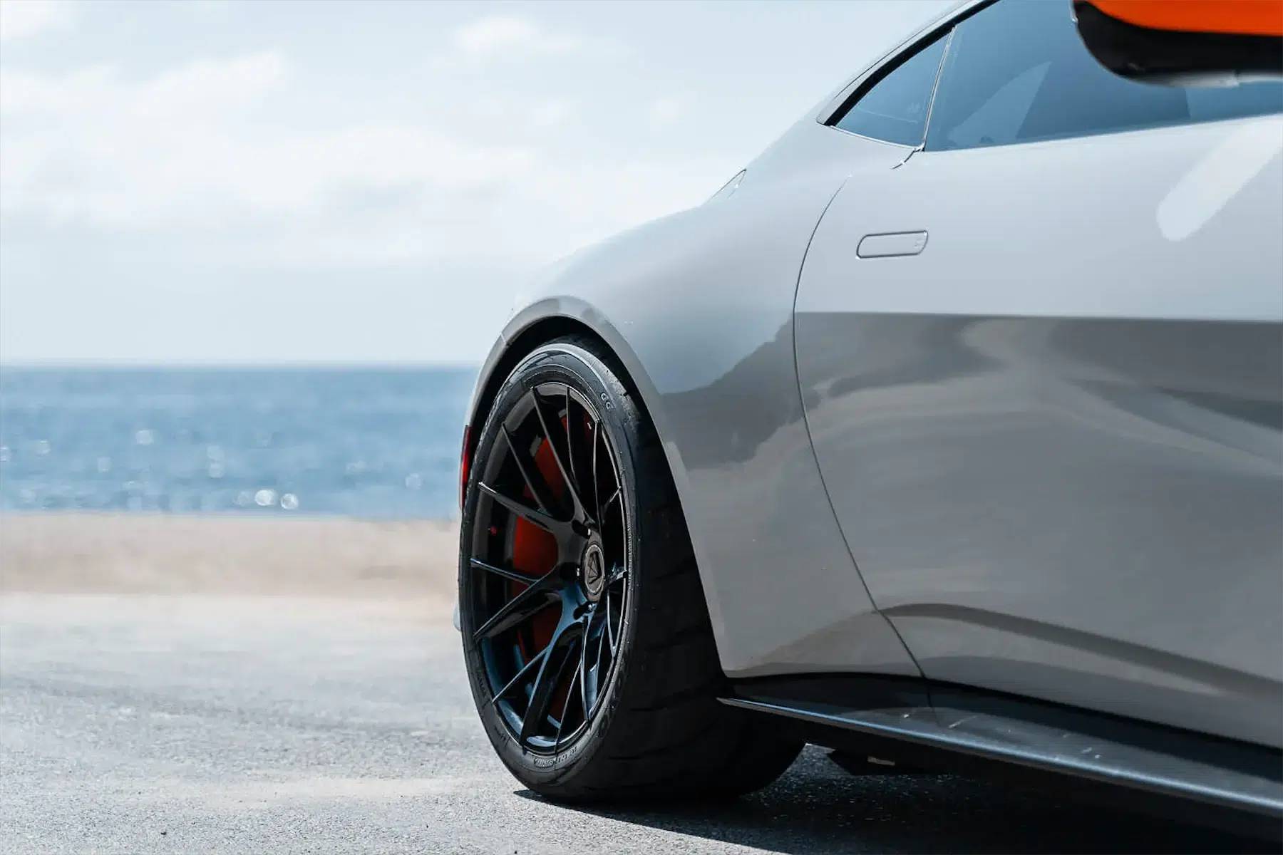 A 2020 Aston Martin Vantage on Blaque Diamond BD-F18 Gloss Black with Orange Barrel Wheels