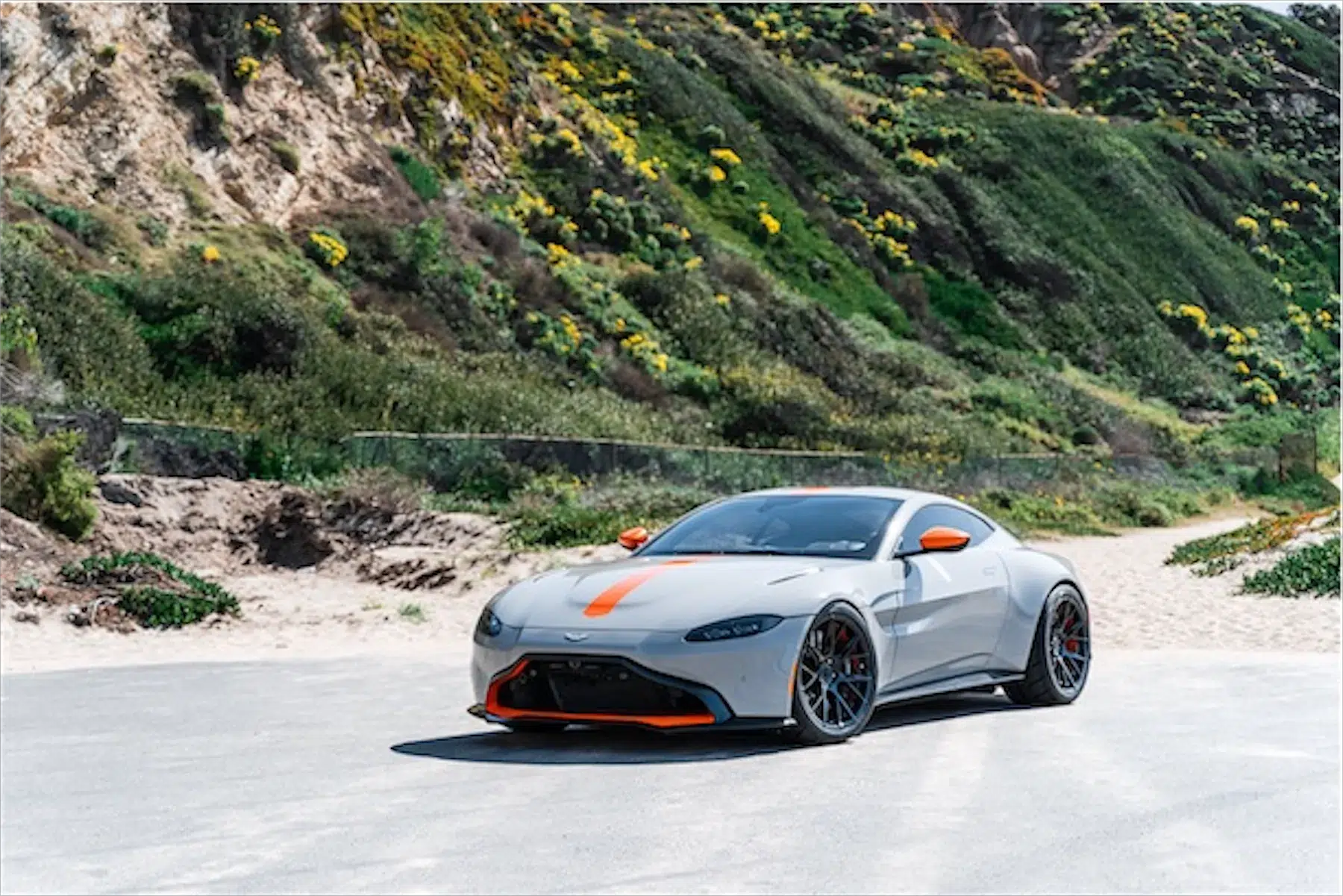 A 2020 Aston Martin Vantage on Blaque Diamond BD-F18 Gloss Black with Orange Barrel Wheels