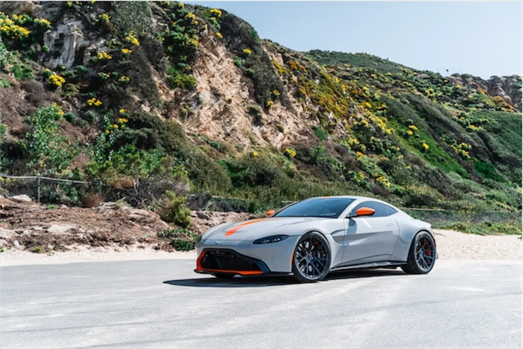A 2020 Aston Martin Vantage on Blaque Diamond BD-F18 Gloss Black with Orange Barrel Wheels