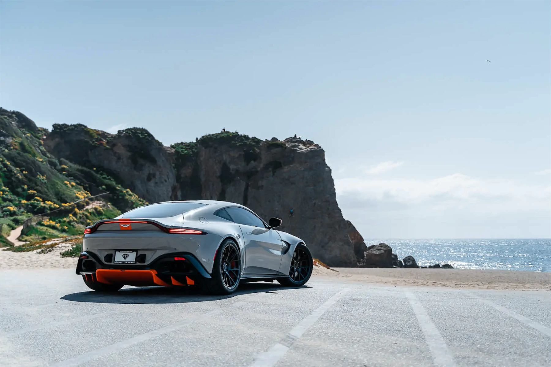 A 2020 Aston Martin Vantage on Blaque Diamond BD-F18 Gloss Black with Orange Barrel Wheels