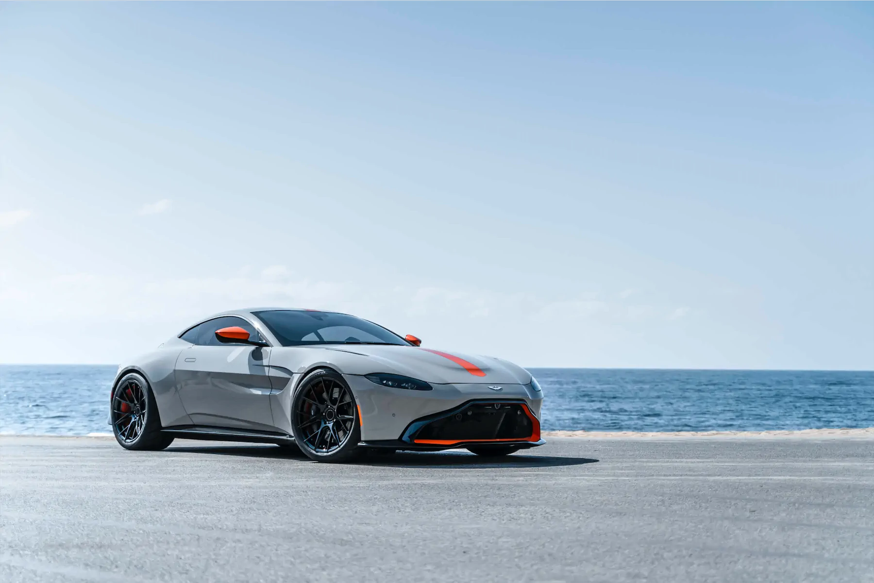 A 2020 Aston Martin Vantage on Blaque Diamond BD-F18 Gloss Black with Orange Barrel Wheels