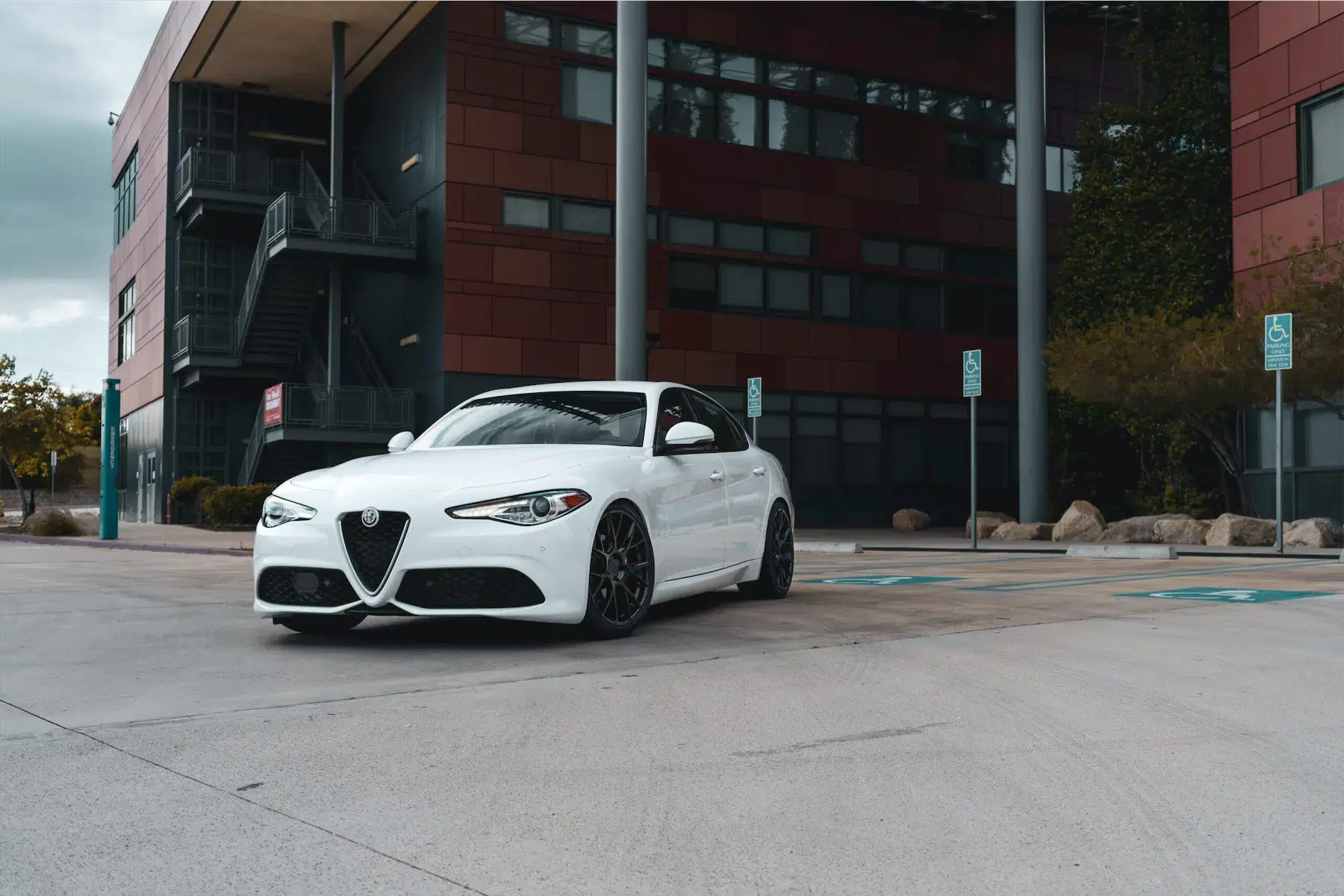 A 2018 Alfa Romeo Giulia on Blaque Diamond BD-F18 Gloss Black Wheels