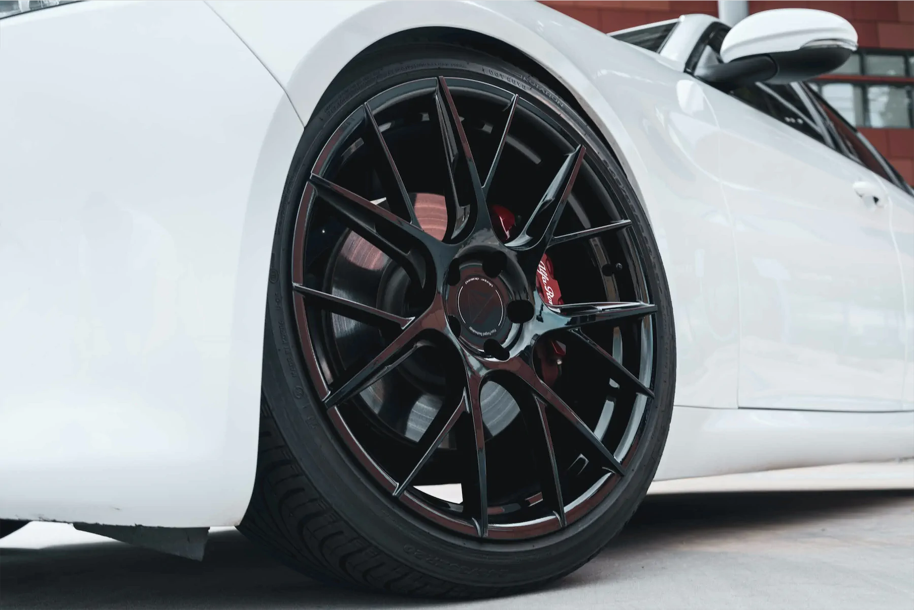 A 2018 Alfa Romeo Giulia on Blaque Diamond BD-F18 Gloss Black Wheels