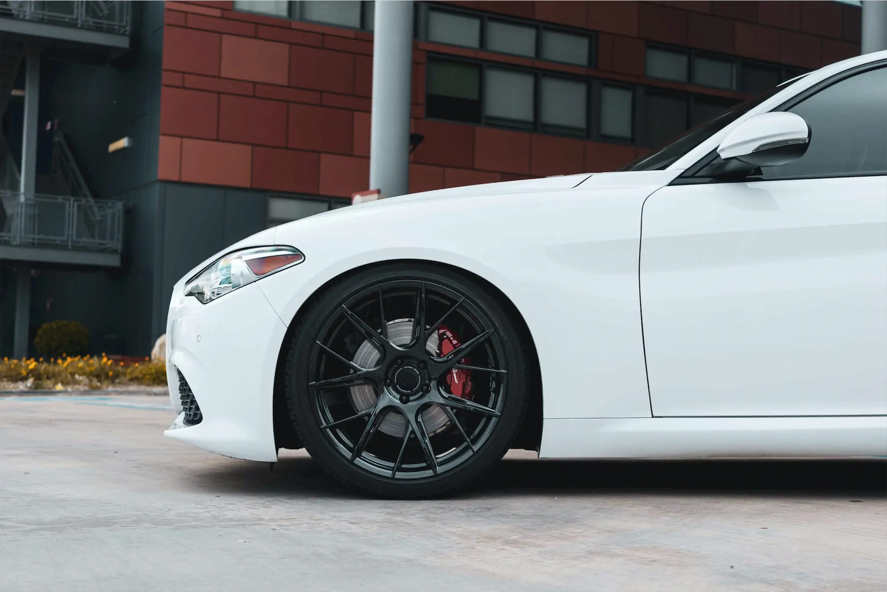 A 2018 Alfa Romeo Giulia on Blaque Diamond BD-F18 Gloss Black Wheels