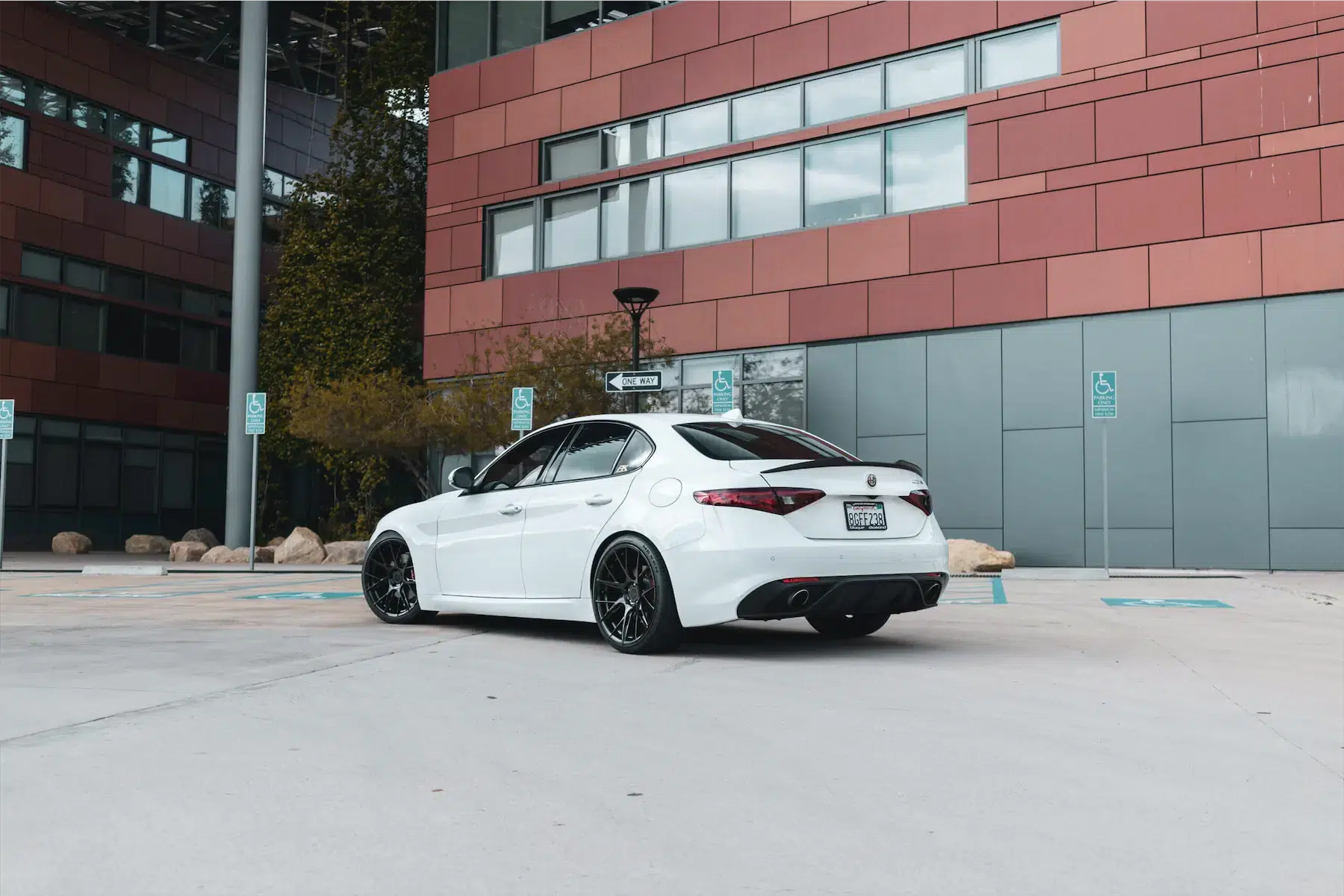 A 2018 Alfa Romeo Giulia on Blaque Diamond BD-F18 Gloss Black Wheels