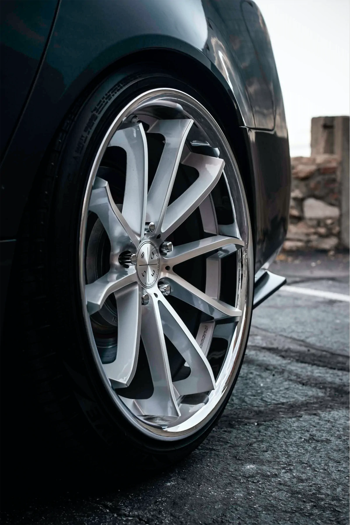 A 2012 Acura TL on Blaque Diamond BD-23 Silver Machined with Chrome Lip Wheels